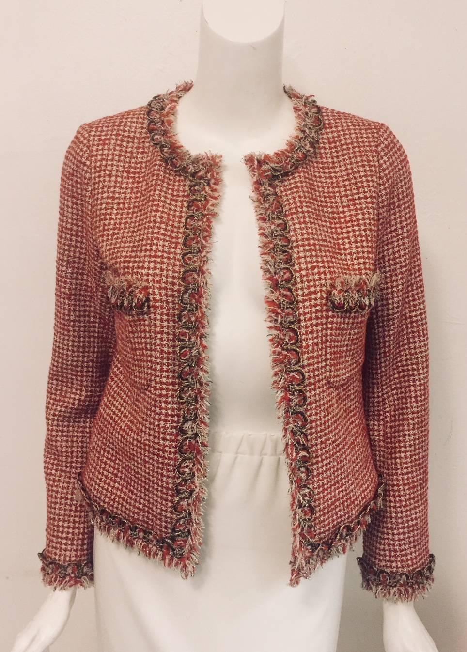 Chanel Red Ivory and Metallic Gold Jacket remains true to the design sensibilities of 