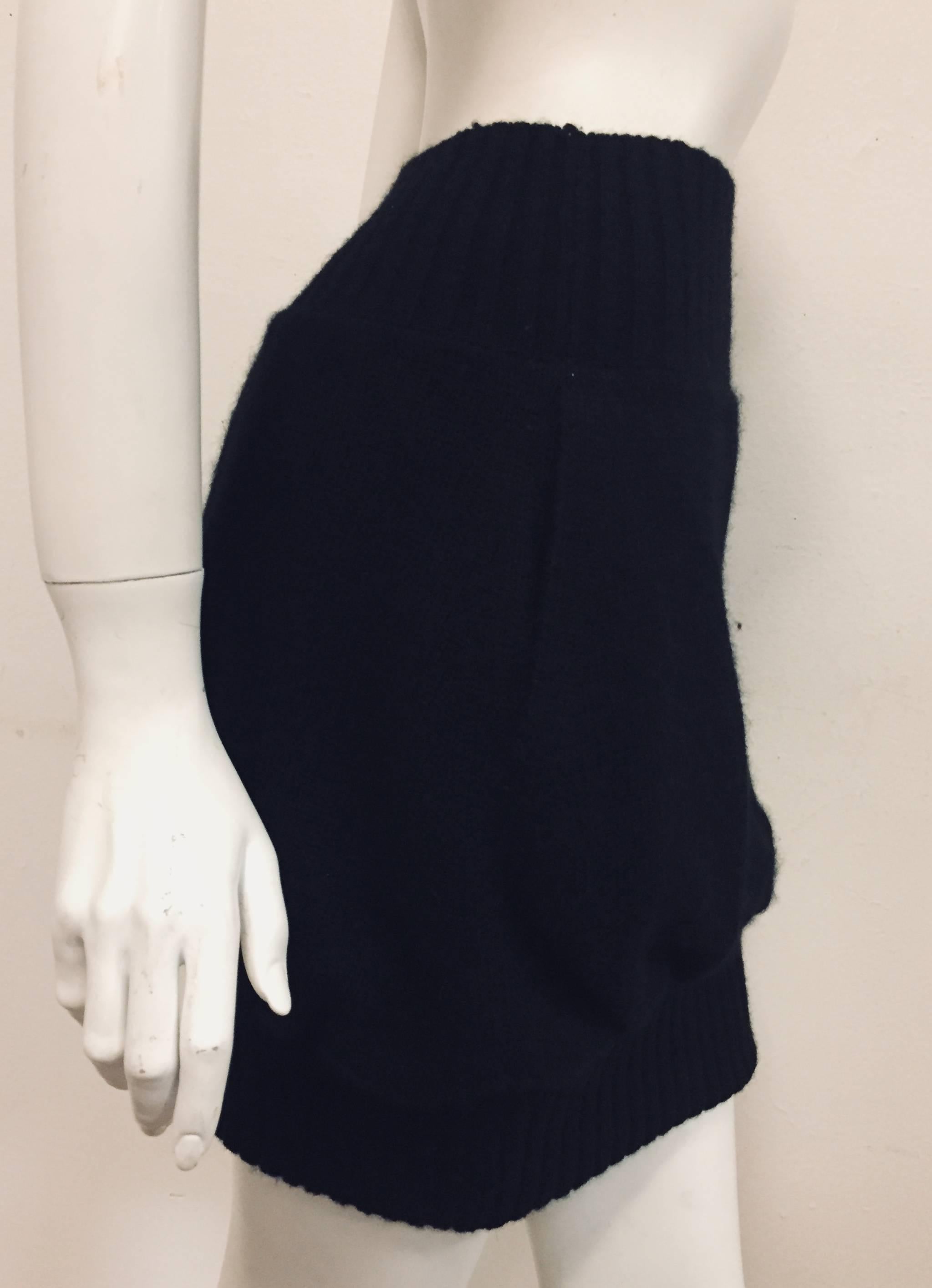 Chanel black Bubble sweater like skirt is ribbed at the waist and also at the hem giving it a bubble (round) effect.   This black cashmere knit skirt can worn with any style top and basically any color.  The skirt is not lined at the waist nor hem
