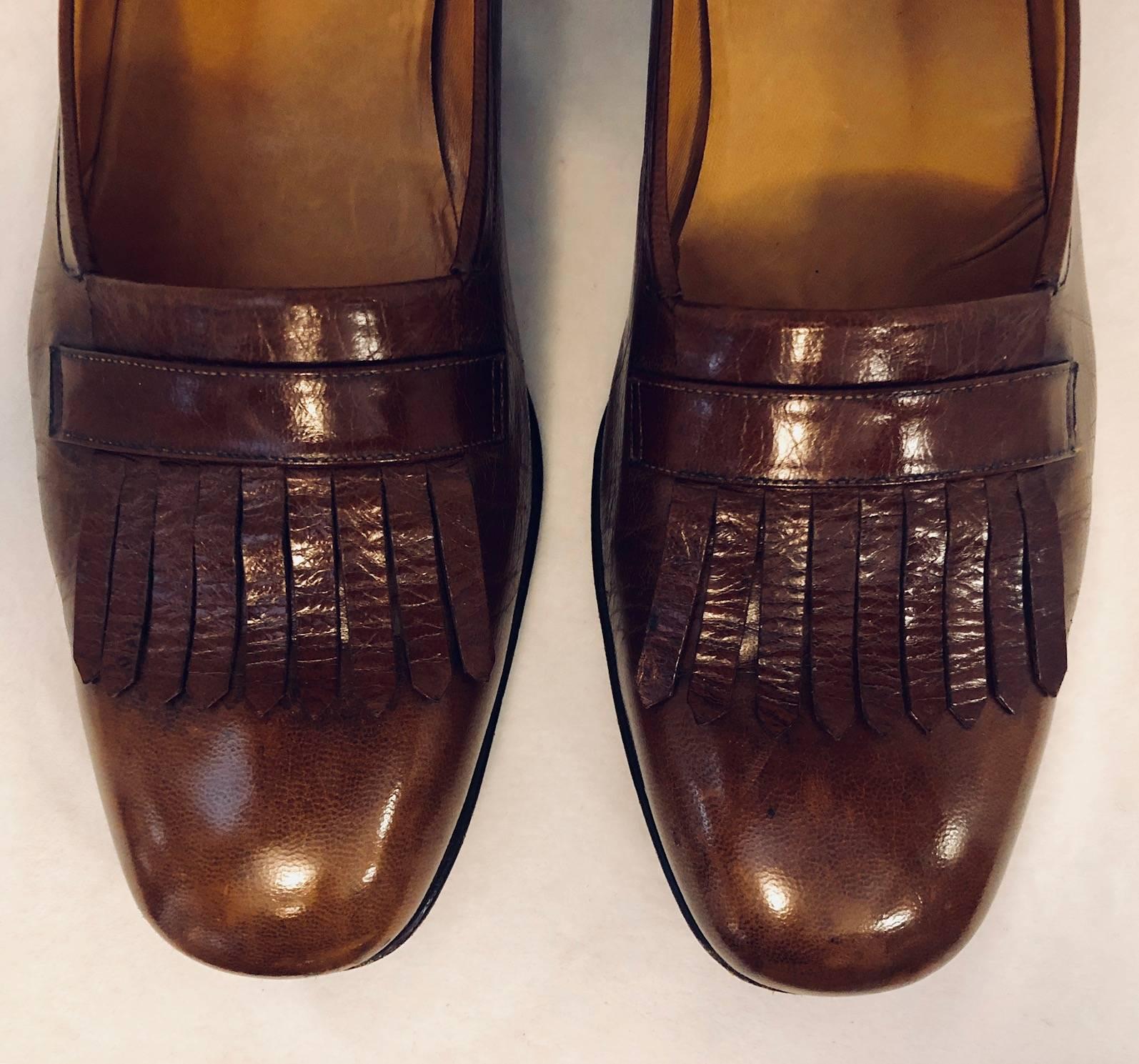 How much more classic can one be, than sporting these vintage Hermes kiltie shoes in a fabulously rich cognac color.  Handsome sumptuous Italian leather, and superb craftsmanship makes these shoes to last a lifetime!  Wear on leather soles and heels