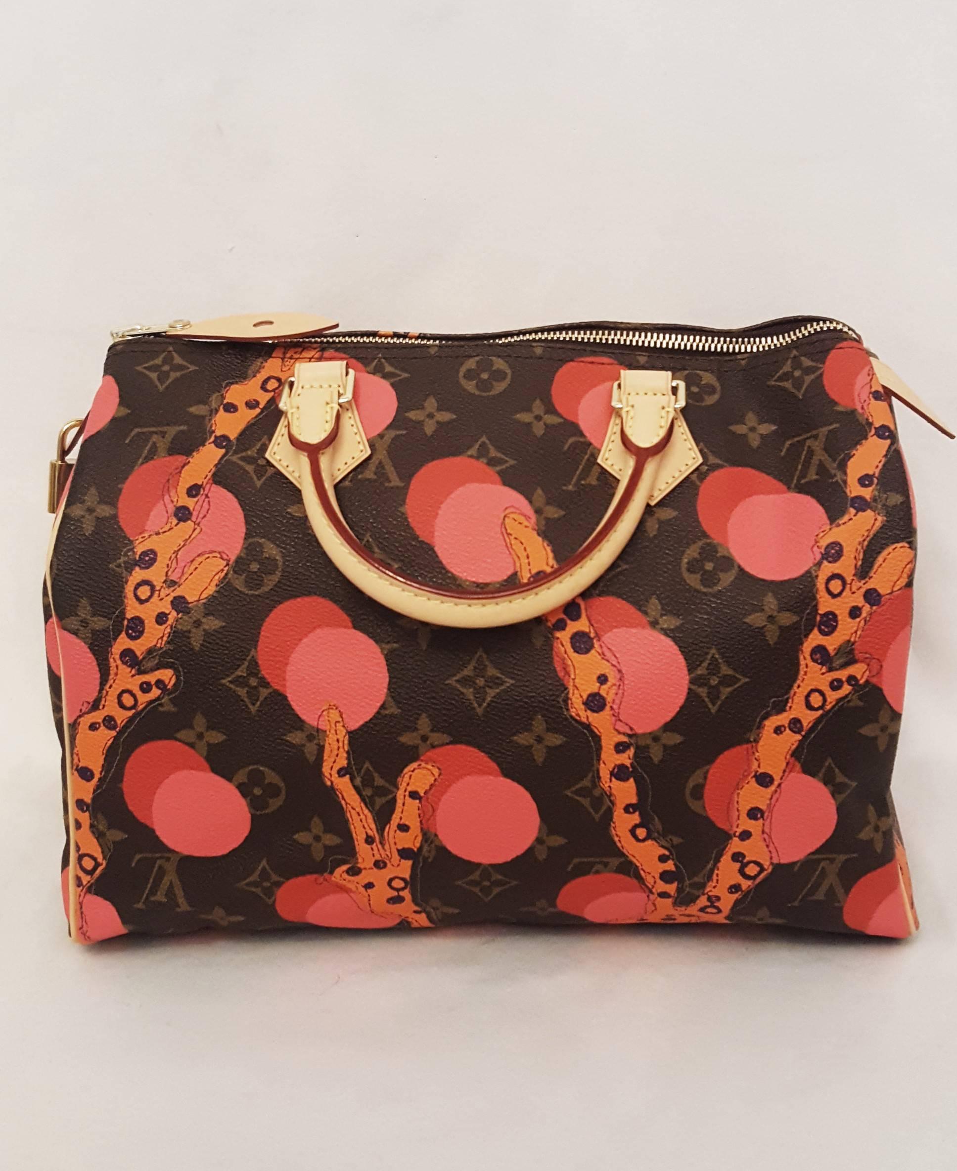 Louis Vuitton Speedy Ramages bag from the 2015 cruise collection features the iconic monogram canvas with the ramages print implemented into this classic Speedy.  Adding the bright coral, red and pink colors to the monogram background launches you