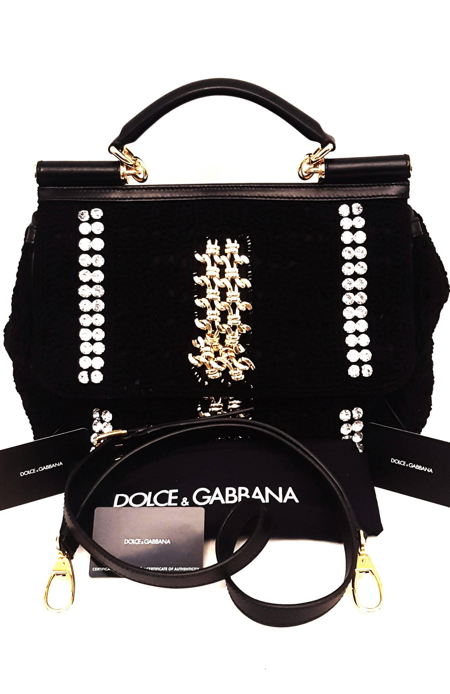 Dolce & Gabbana black crochet Miss Sicily top handle flap with crystal and gold chain band decorations at front and back give this bag the over the top opulence as required by Dominico and Stefano.  This chic satchel is luxuriously crocheted in