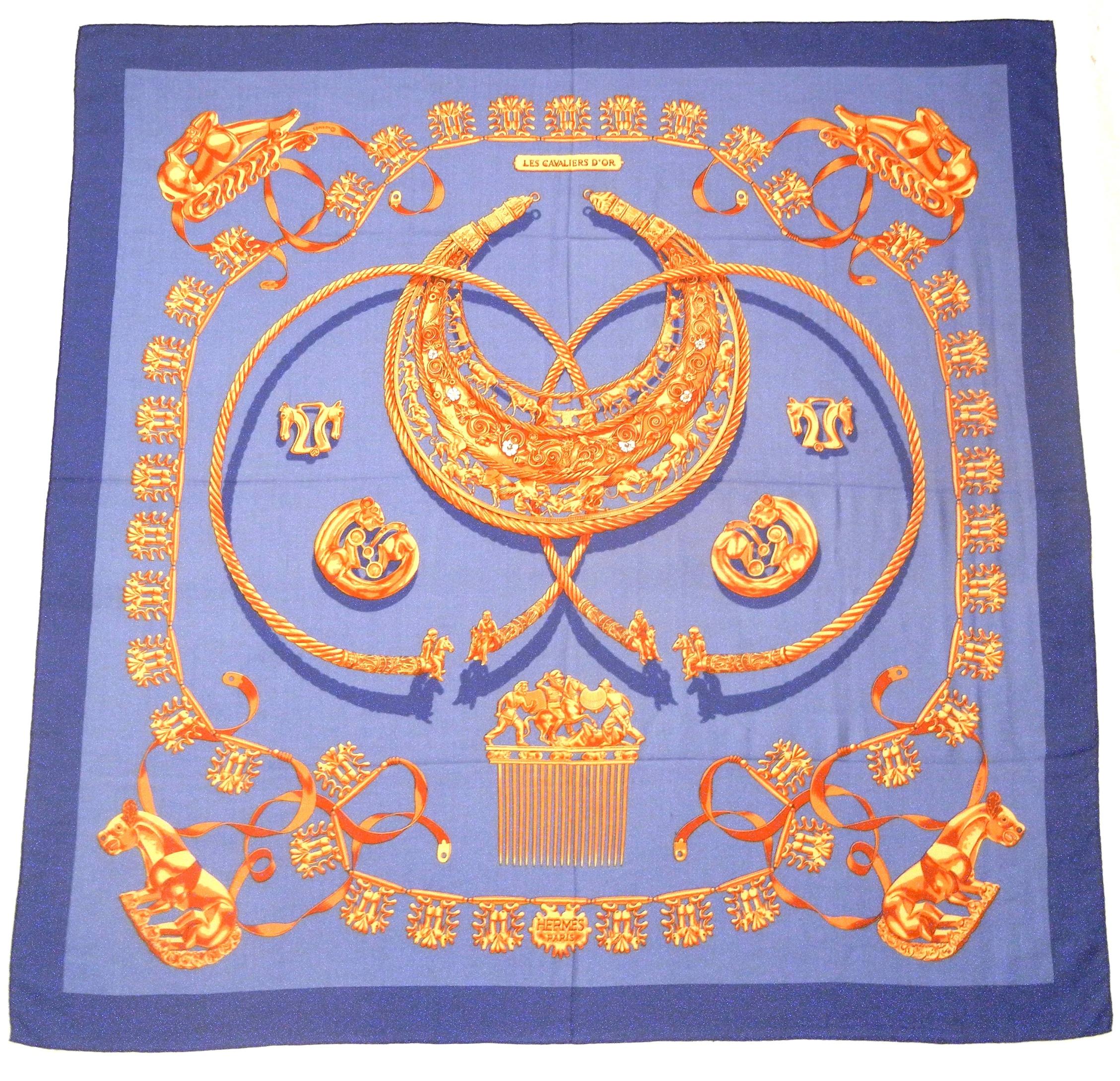 Hermes cashmere and silk shawl Les Cavaliers D'Or, designed by Vladimir Rybaltchenko, has become highly desired by connoisseurs of fine silk scarves. This magnificent design by one of Hermes' most beloved artists, depicts a solid gold Scythian