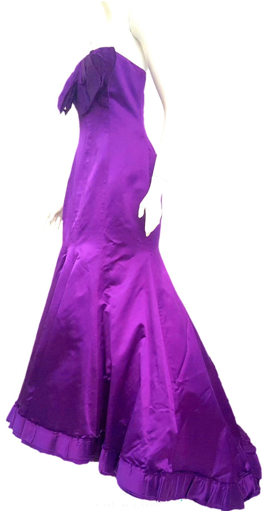 Vera Wang Magnolia wedding dress in magenta color!  Guess not all brides wear white!   Also this outstanding dress can be worn to any ball or party with multiple tulle and organza petticoats.   The Magnolia style is a classic wedding dress that