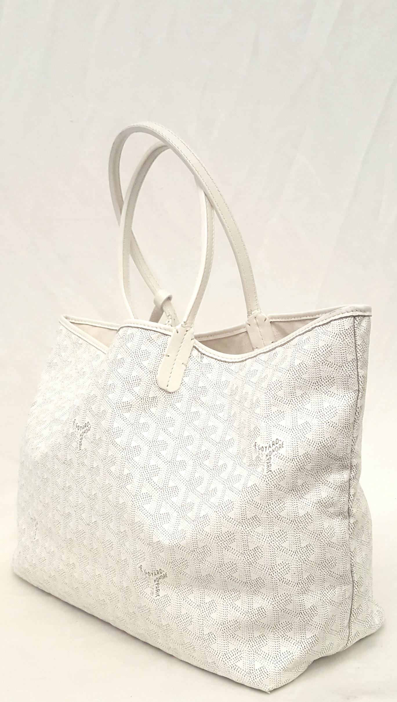 Goyard white monogram St. Louis chevron  tote that includes a small change or essentials purse attached to the tote.  This bag is  lined in beige canvas.  Very lightweight tote that is even cleanable with mild soap and water!  An ultra stylish and