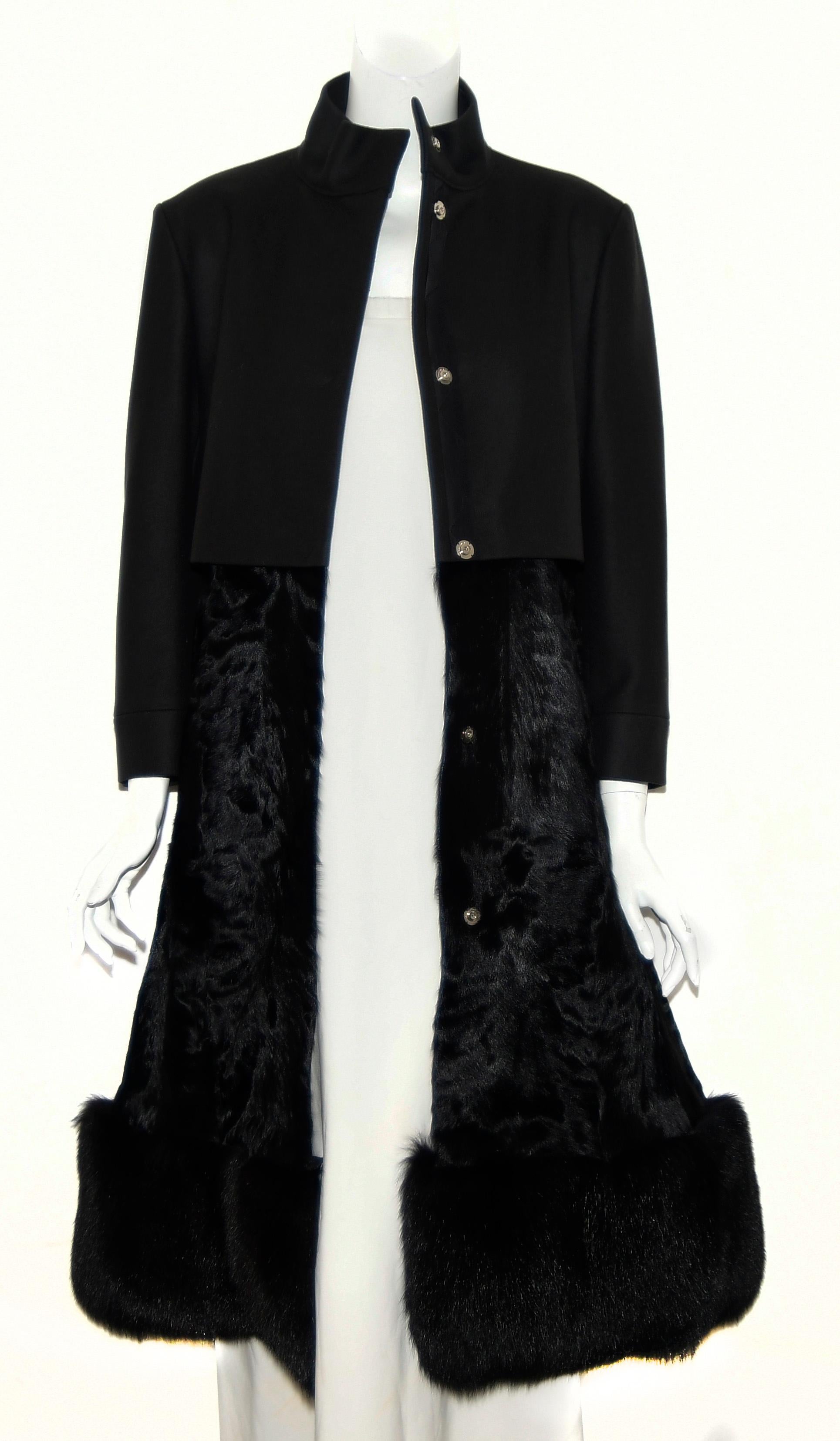 Costume National wool and cashmere coat is a stunning garment that combines fox and goat fur to create a masterpiece.  The top of the coat gives the appearance of a cropped jacket with the bottom of coat the front and back covered in goat (kid) fur.