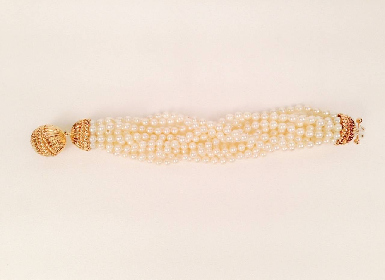 Multi-Strand Pearl Bracelet with Heavy Gold Clasp In New Condition For Sale In Palm Beach, FL