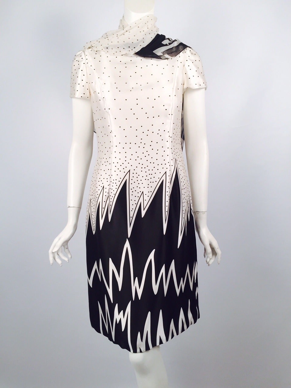 100% Silk Fiandaca Black and White Polka Dots and Flames Dress  is an ode to classic style and 