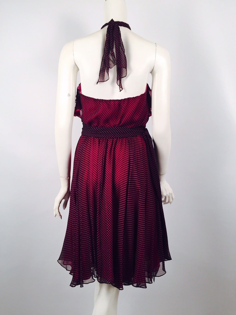 100% Silk Fiandaca Fuschia and Black Polka Dot Dress is an ode to classic style and 