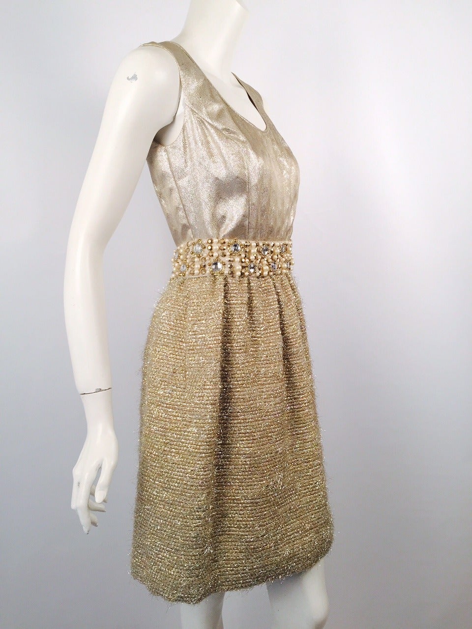New Fiandaca Sleeveless Metallic Dress is an ode to classic style and 