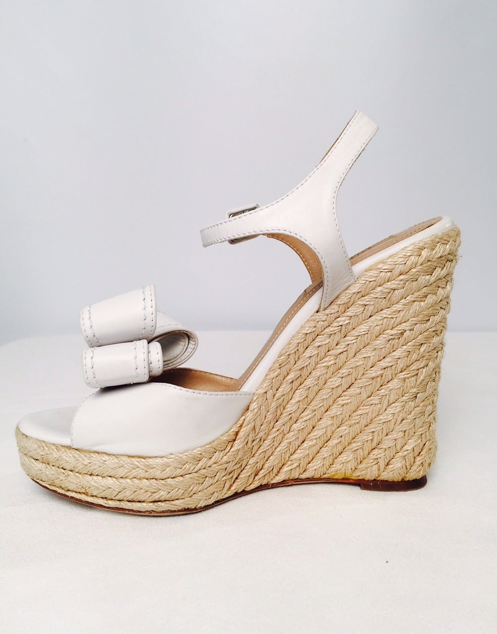 Valentino Garavani High Heel Espadrille Wedge Sandals are worthy of ANY Riviera...Spanish, French, and Italian (of course!).  Features plaited fiber, adjustable ankle straps, luxurious white leather and tan leather insoles.  Leather soles. 