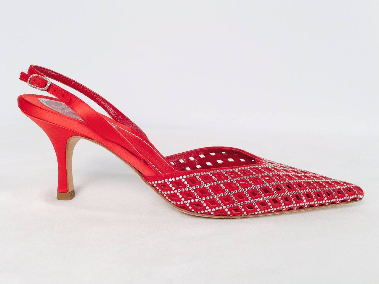 You are no longer in Kansas!  Rene Caovilla Resplendent Red Suede and Satin Evening Shoes are worthy of the 