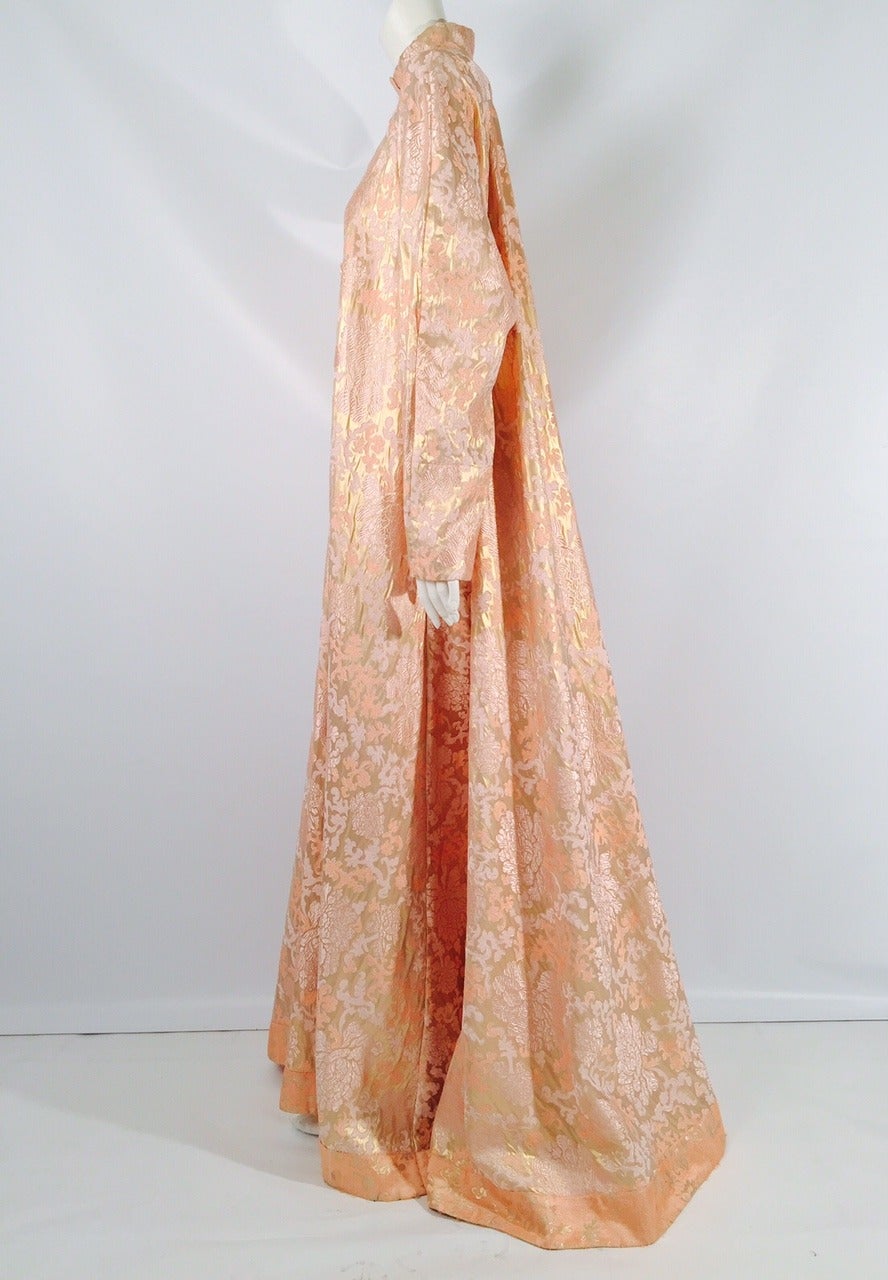 For Bergdorf Goodman, Fernando Sanchez designed this stunning and exuberant 100% silk brocade coat.  Although renown for lingerie, Sanchez garments were often worn in public (way before this became a fad of the 1990s).  Features floor-length 