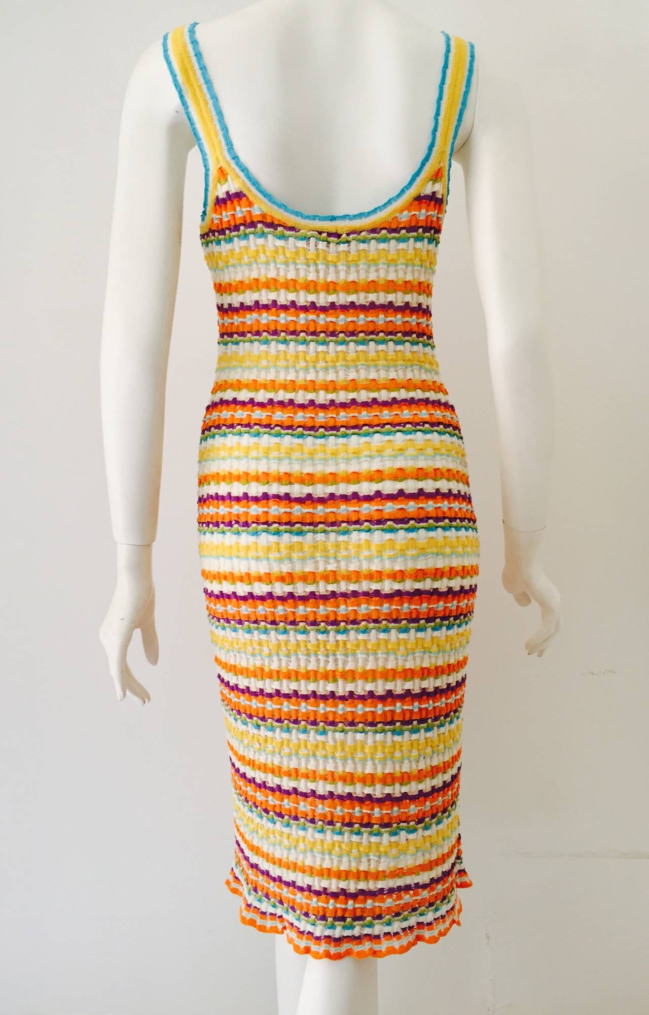 Multicolor Missoni Shirred Sheath Dress is true to the legacy of Tai and Rosita!  No wonder this duo was selected to design uniforms for the Italian Olympic team.  Features athletic tank sleeves and body-conscious silhouette enhanced by advanced