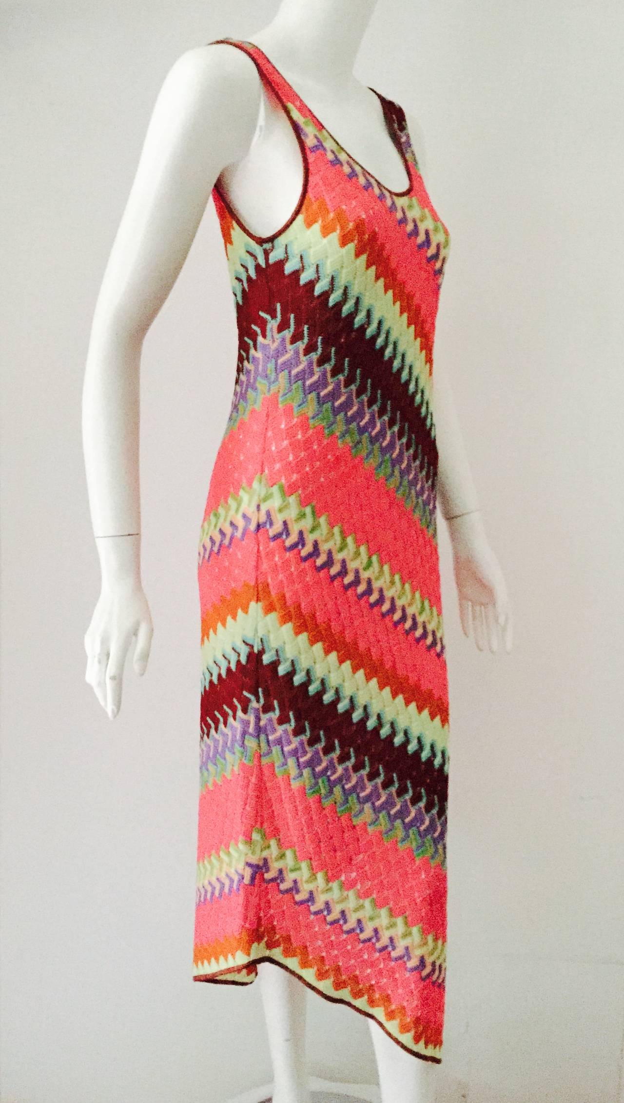 Multicolor Missoni Asymmetric Sheath Dress is true to the legacy of Tai and Rosita! No wonder this duo was selected to design uniforms for the Italian Olympic team. Features athletic tank sleeves and body-conscious silhouette enhanced by diagonal