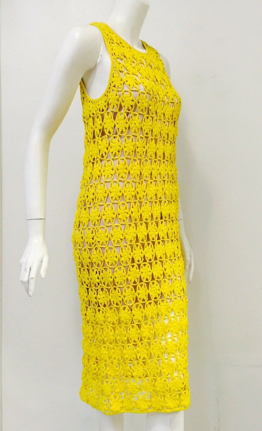 Fabulous Crochet Sleeveless Sheath proves that Diane von Furstenberg is much more than her signature wrap dress!  Features round neck, sunburst yellow daisy crochet all over and silk stretch lining.  Sophisticated, slightly below the knee length and
