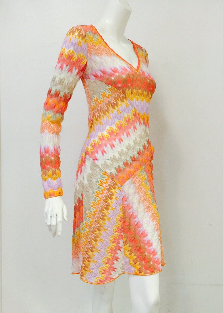 Amazing Multi Color Long Sleeve Bias Cut Dress is true the design aesthetic of one of Italy's most celebrated brands, Missoni!  Advanced knit technique?  Absolutely!  Dress features unique and distinct pattern and color combination.  Effortless