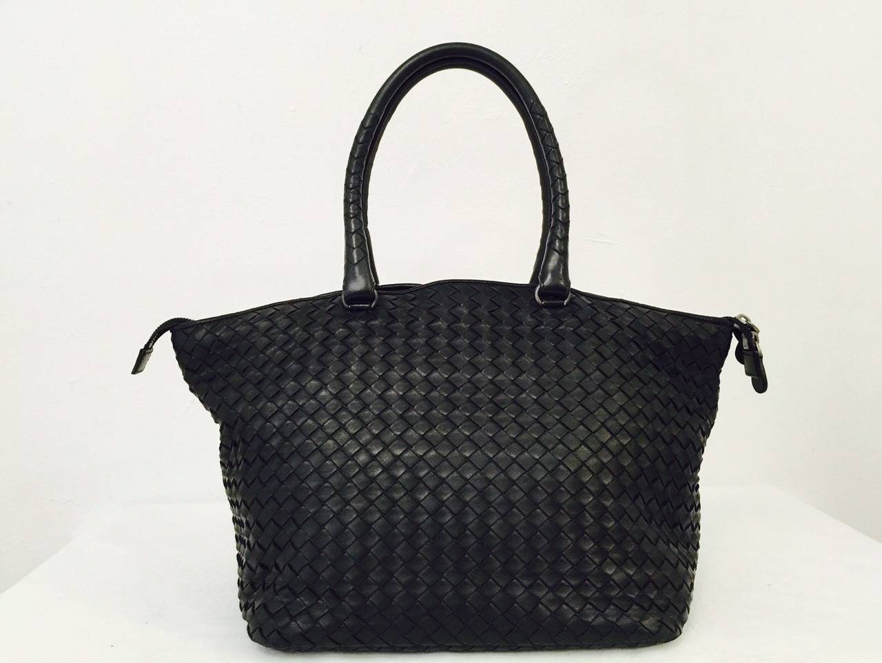 Not your typical tote!  Bottega Veneta Black Leather Tote illustrates why these have become a staple in the wardrobes of the world's most stylish women.  Never garish or overly embellished, Bottega Veneta handbags are renown for sophisticated style