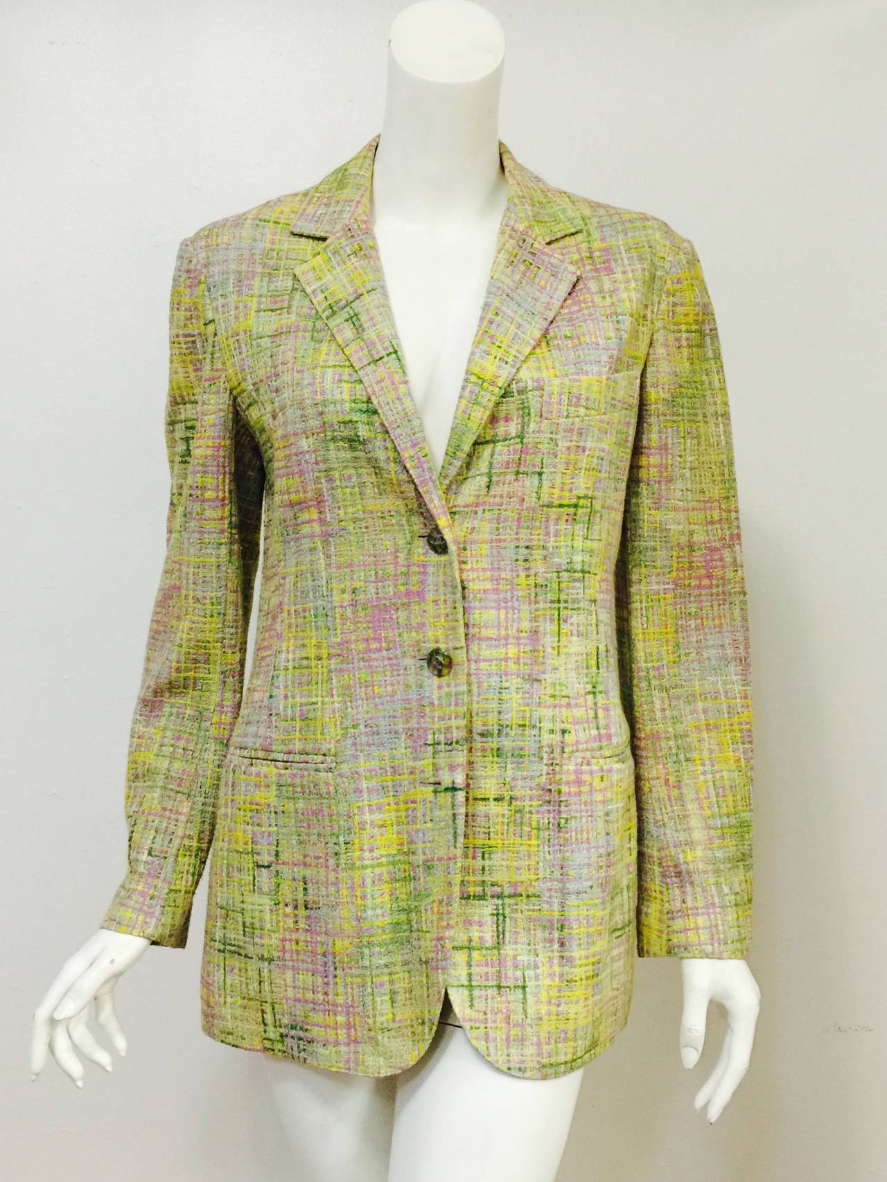 Chanel 1998 Spring Tweed Boyfriend Jacket is strong enough for an homme but made for a femme!  Features exquisite cotton blend fabric and fine tailoring techniques associated with the most celebrated menswear designers.  Primarily citrus yellow,