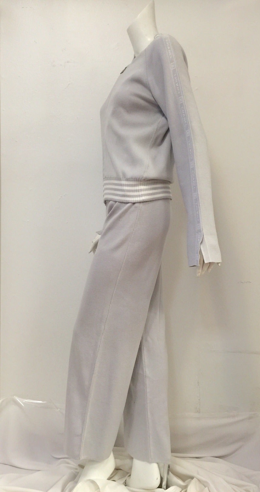 Chanel Spring 2004 Sporting 3-Piece Suit reminds us that Coco made clothing from men's jersey knit in the 1920's!  Like Chanel herself, this 3-piece ensemble is modern, sophisticated and chic.  Features ultra luxurious grey 100% cotton jersey,