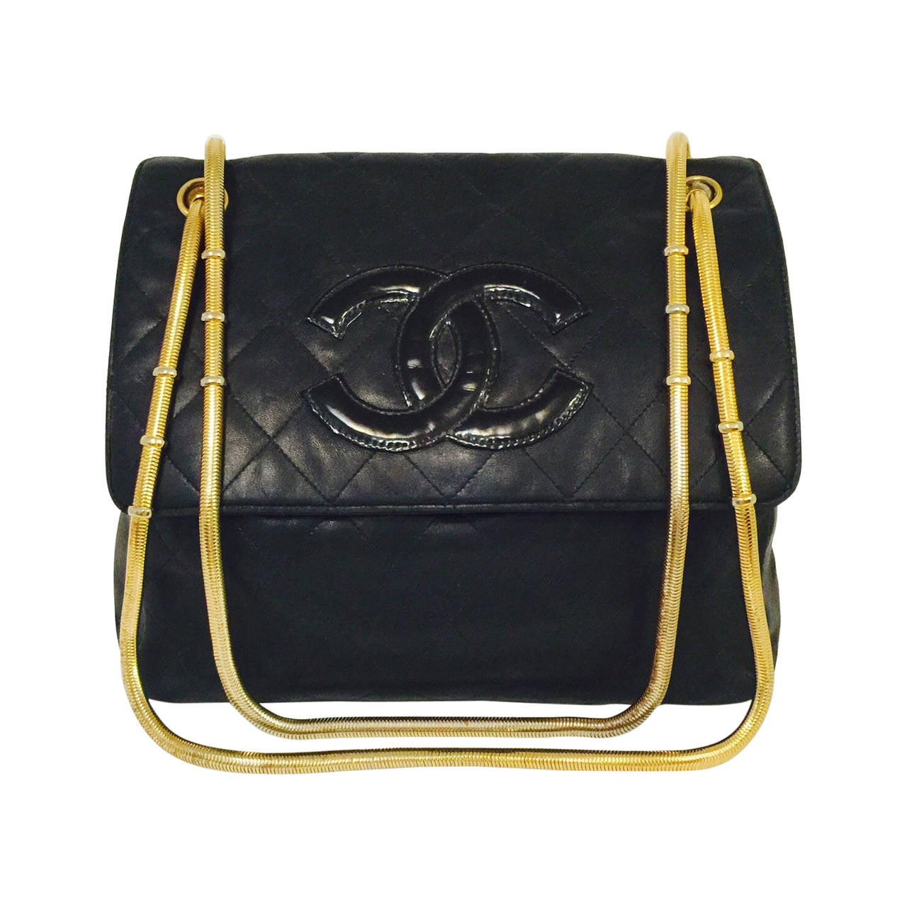 1990s Chanel Black Quilted Lambskin Shoulder Bag With Serpentine Strap For Sale