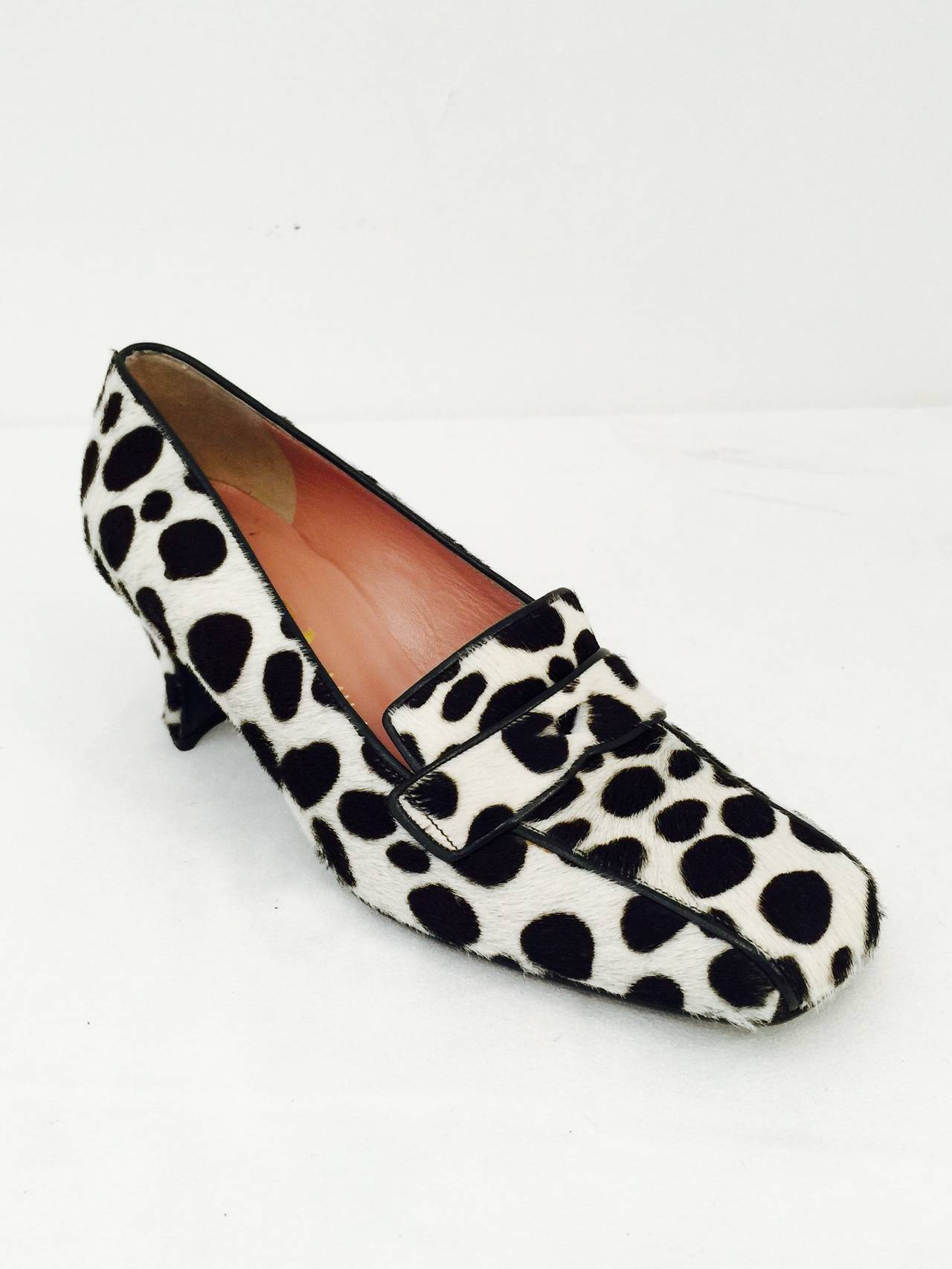 Prada Low Heel Loafer Pumps are a classic shape and style crafted in ultra-luxurious ponyskin!  Features square 
