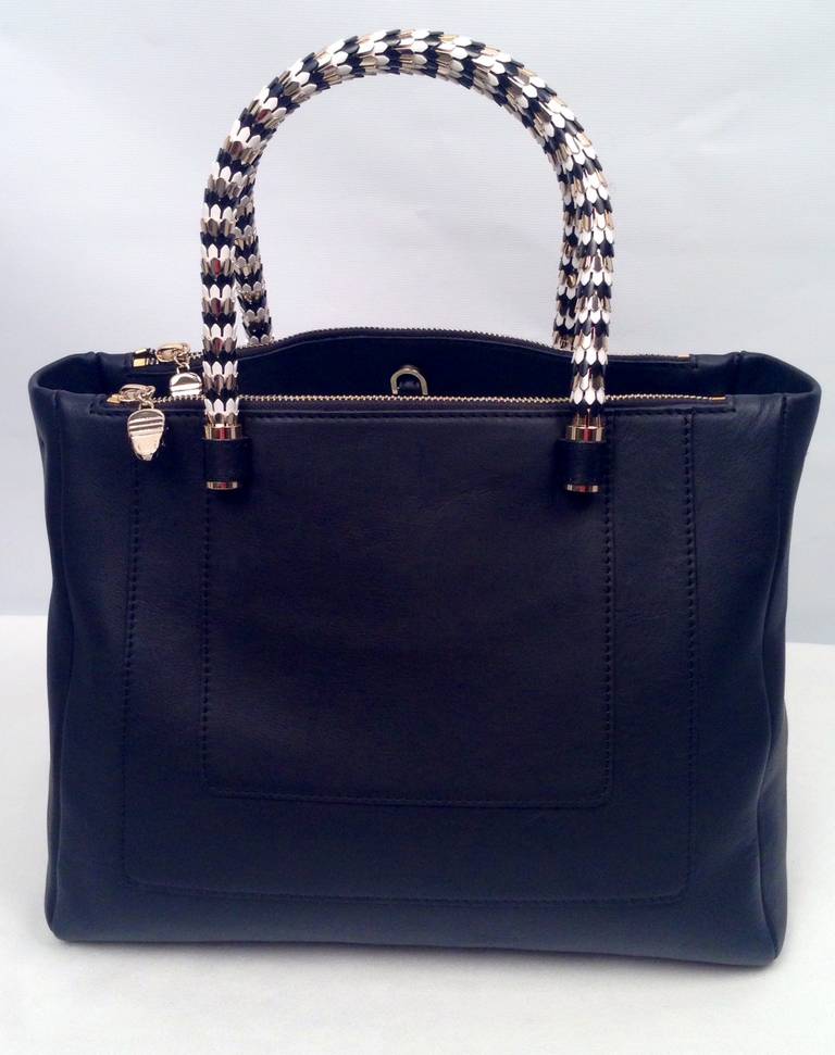 Sold out everywhere except here!  Even Bvlgari can't meet celebrity demand for this jewel of a bag.  Black nappa leather 