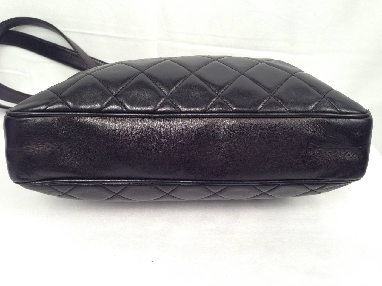Women's 1990's Chanel Quilted Lambskin Tote With Gold Bauble For Sale