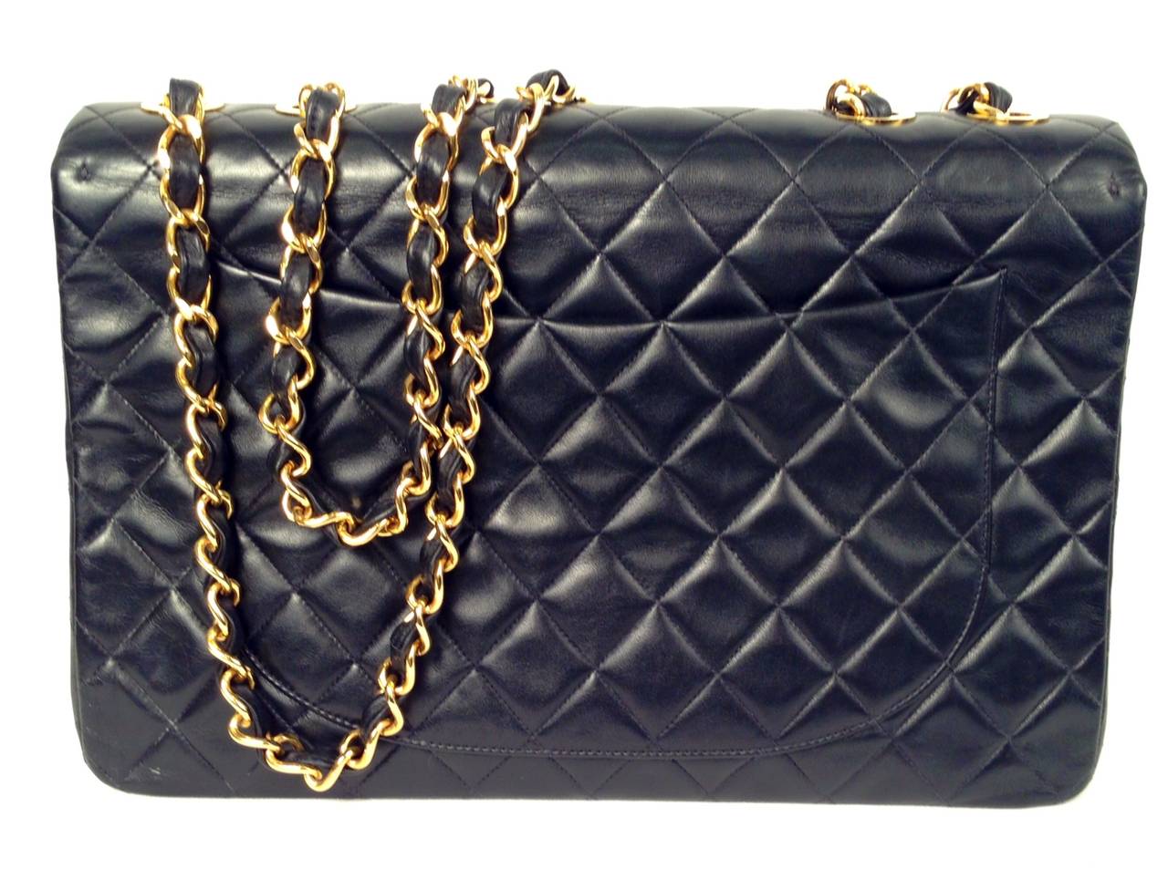 Calling all supermodels! Mid-1990's Maxi Classic Quilted Single Flap Bag is no longer available in boutiques. A stunning bag that is hard to find, the Maxi Classic is highly desired by collector's worldwide. Features include signature lambskin
