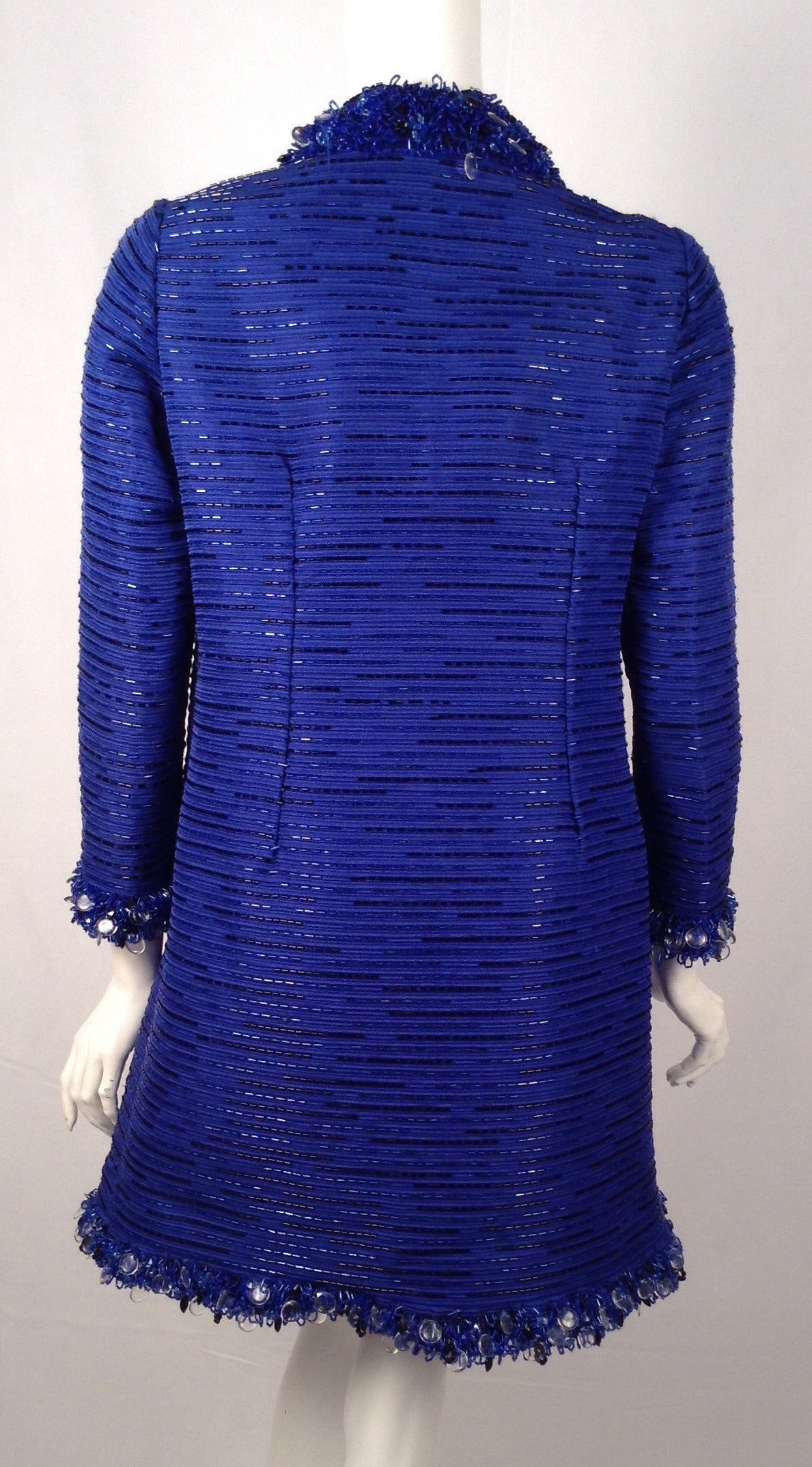 Vintage Roberto Capucci Beaded Cocktail Dress is an excellent example of haute couture techniques that defined fashion in Paris and Rome in the 1950's and 1960's.  As is evident in this dress, Roberto Capucci was greatly influenced by shapes,
