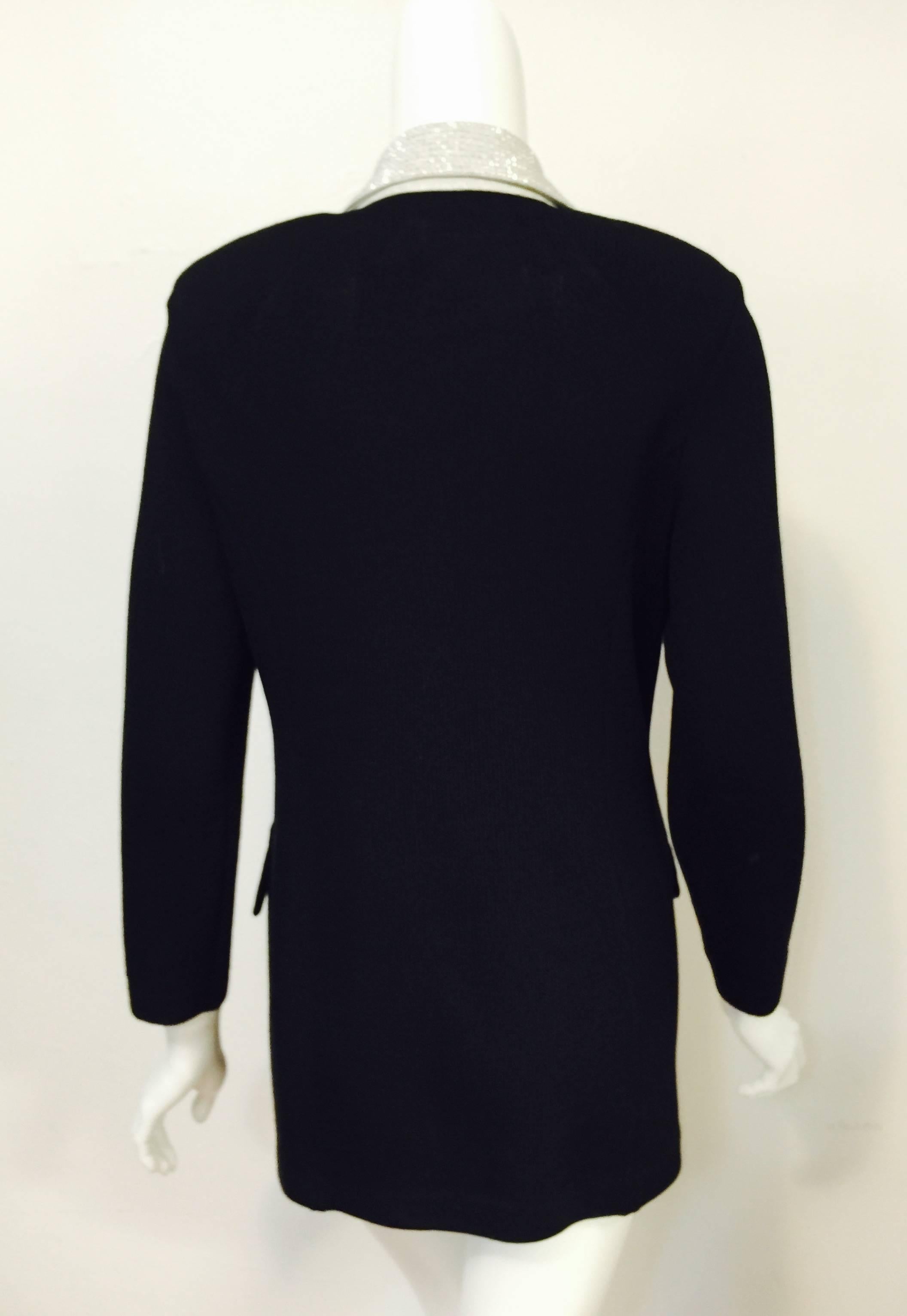 St. John Evening Black Jacket is as comfortable as it is chic!  Crafted in the tradition that made Marie Gray world famous and one of the most successful designers of the late 20th Century.  Features longer-length, 