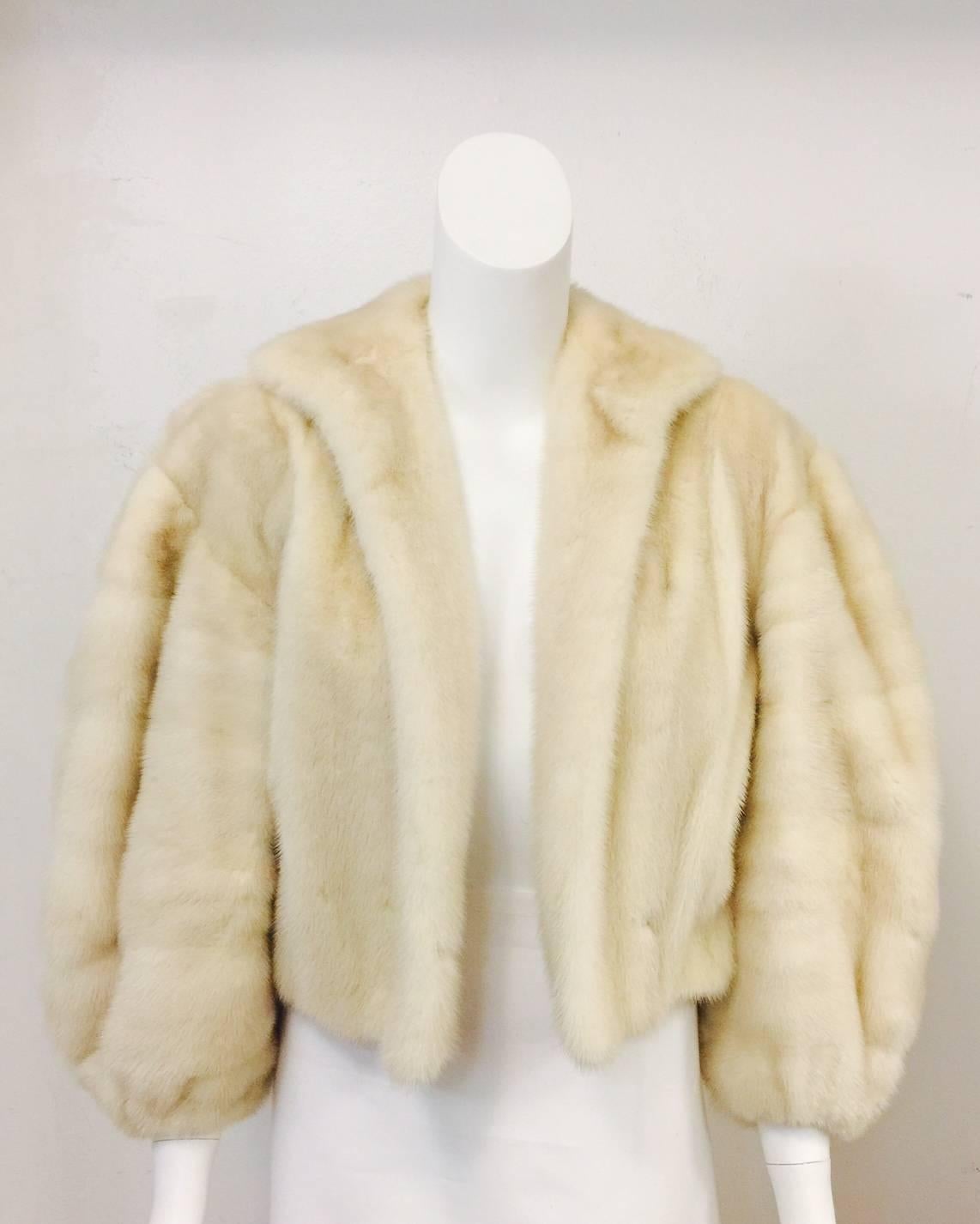 This Yves Saint Laurent Golden Pearl Mink Chubby was purchased at the legendary Alixandre Furs in New York City.  In unbelievable condition, this jacket features ultra-luxurious mink pelts and a classic 
