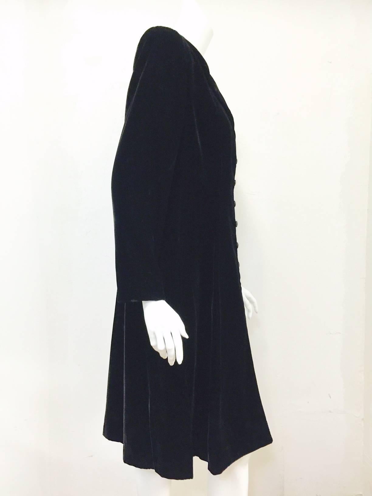 Velvet Evening Coat shows why Giorgio Armani is widely recognized as one of the most influential designers of the last 40 years.  Features fine Italian fabric and craftsmanship.  Coat may is the perfect complement to long skirts, slacks, or stands