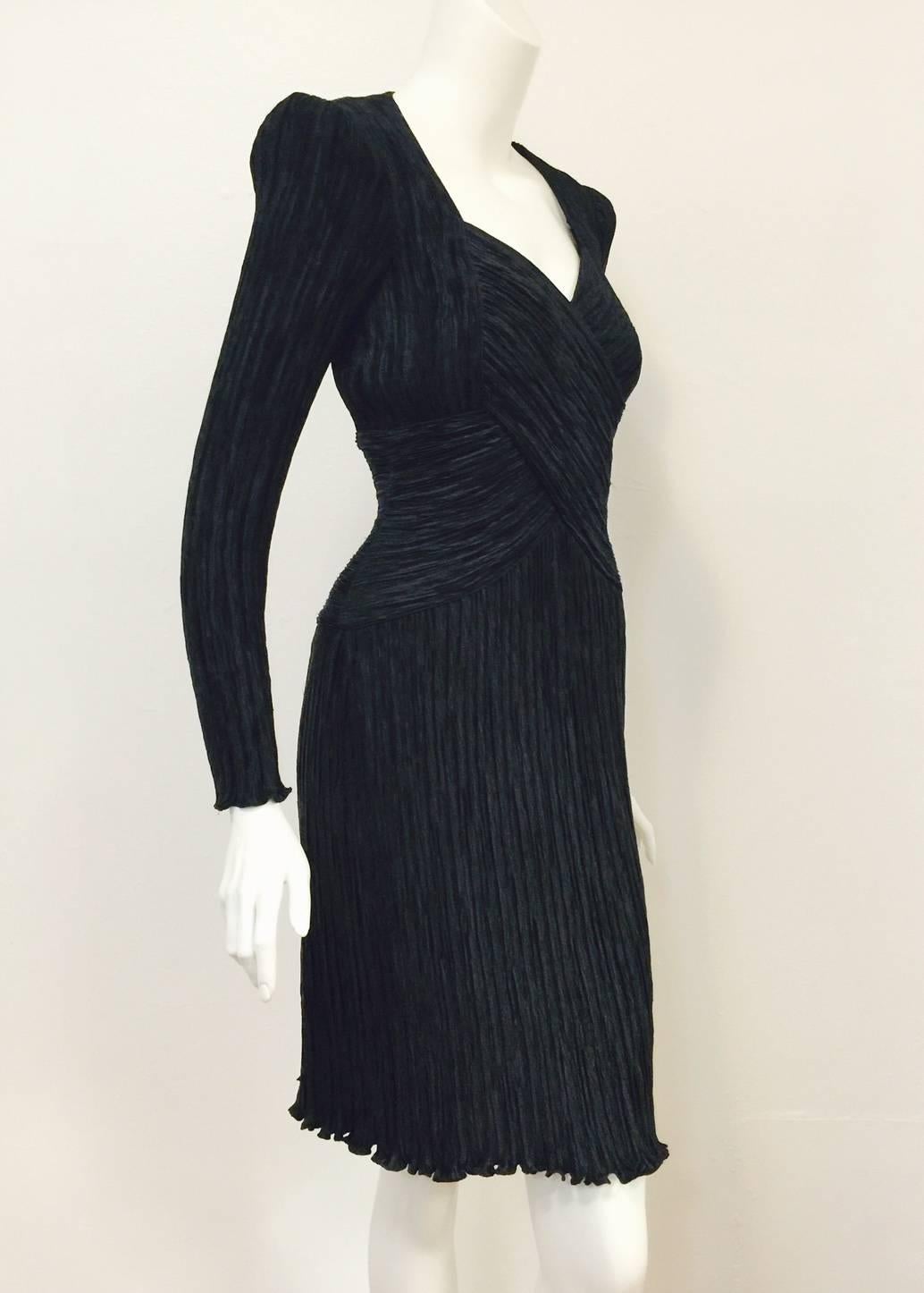 Vintage Black Cocktail Dress is a must for any connoisseur of Mary McFadden Couture!  Not your typical 