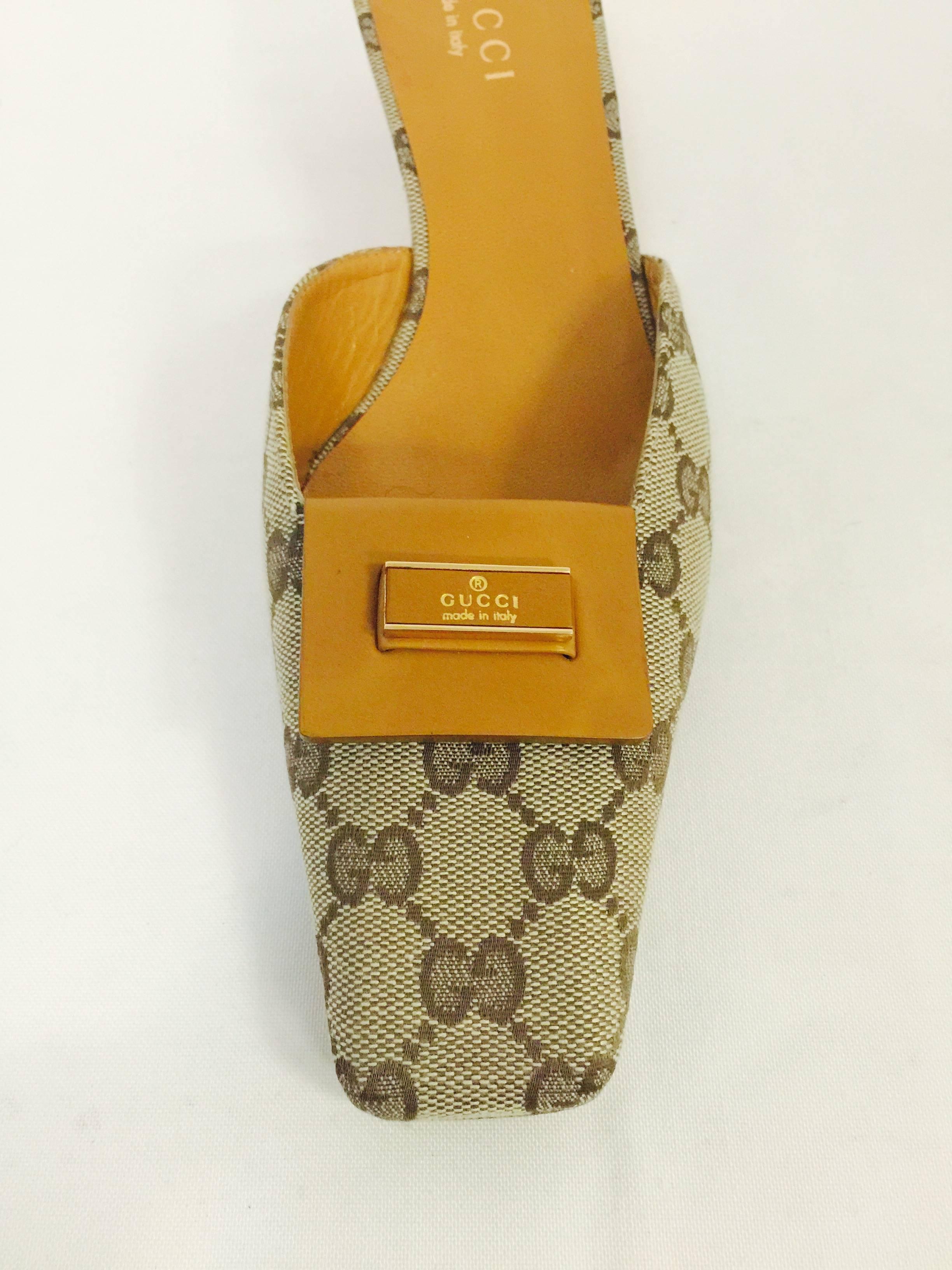 Never Worn Gucci Beige and Ebony Monogram Canvas Square Toe Slides  In New Condition In Palm Beach, FL