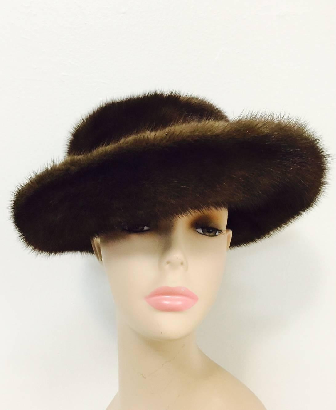 Lenore Marshall Hat is crafted from the most luxurious mink pelts available.  No wonder many of Hollywood's most celebrated actors have worn her designs in film, including Barbara Streisand!  Slightly offset, upturned brim is wider in the front and