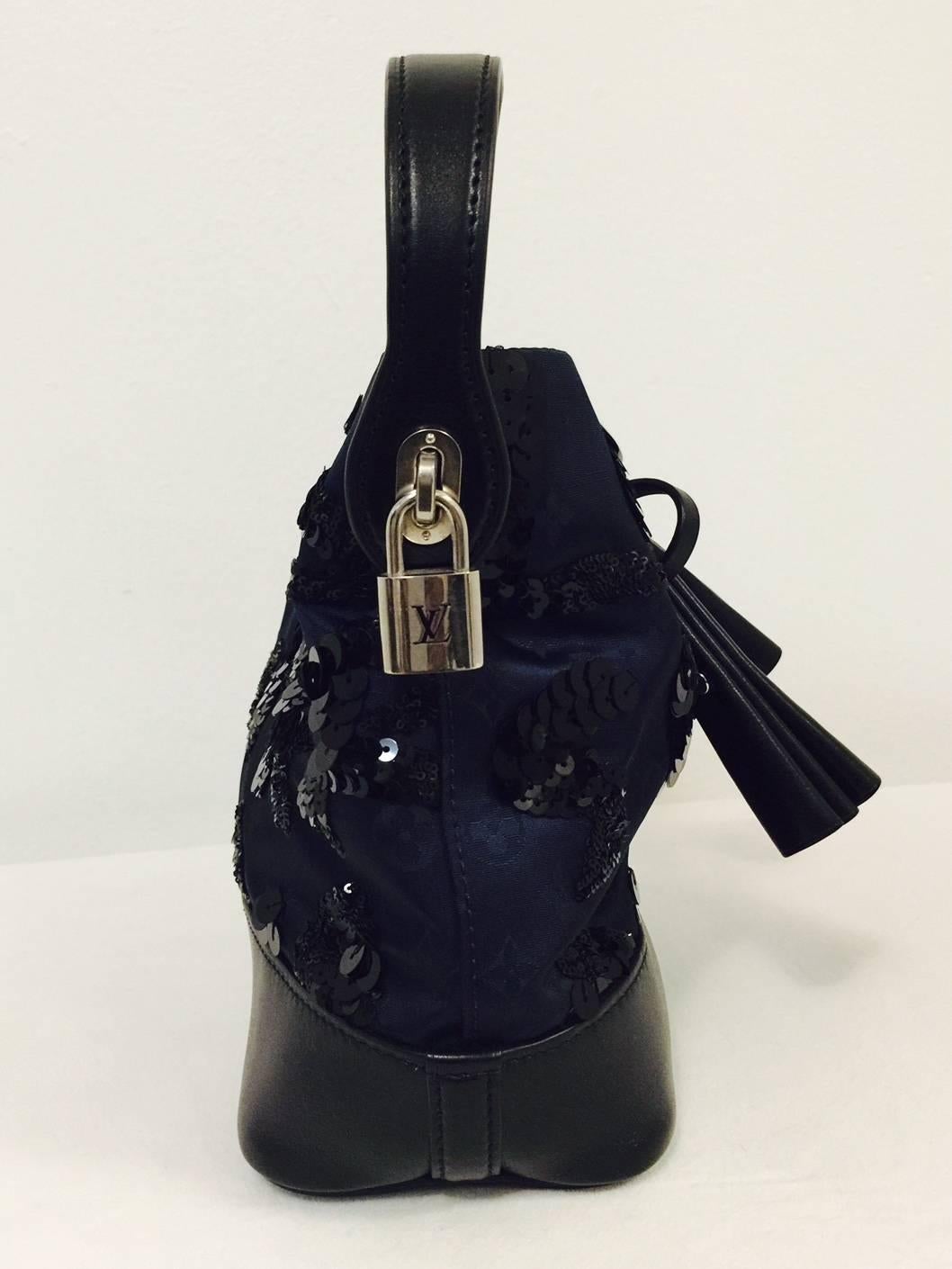 The limited edition NN14 was created through what Marc Jacobs described as a “cleaning” of the original design. Smaller, more streamlined, but still recognizable as a “bucket” for champagne or otherwise, the NN14 became the signature bag of