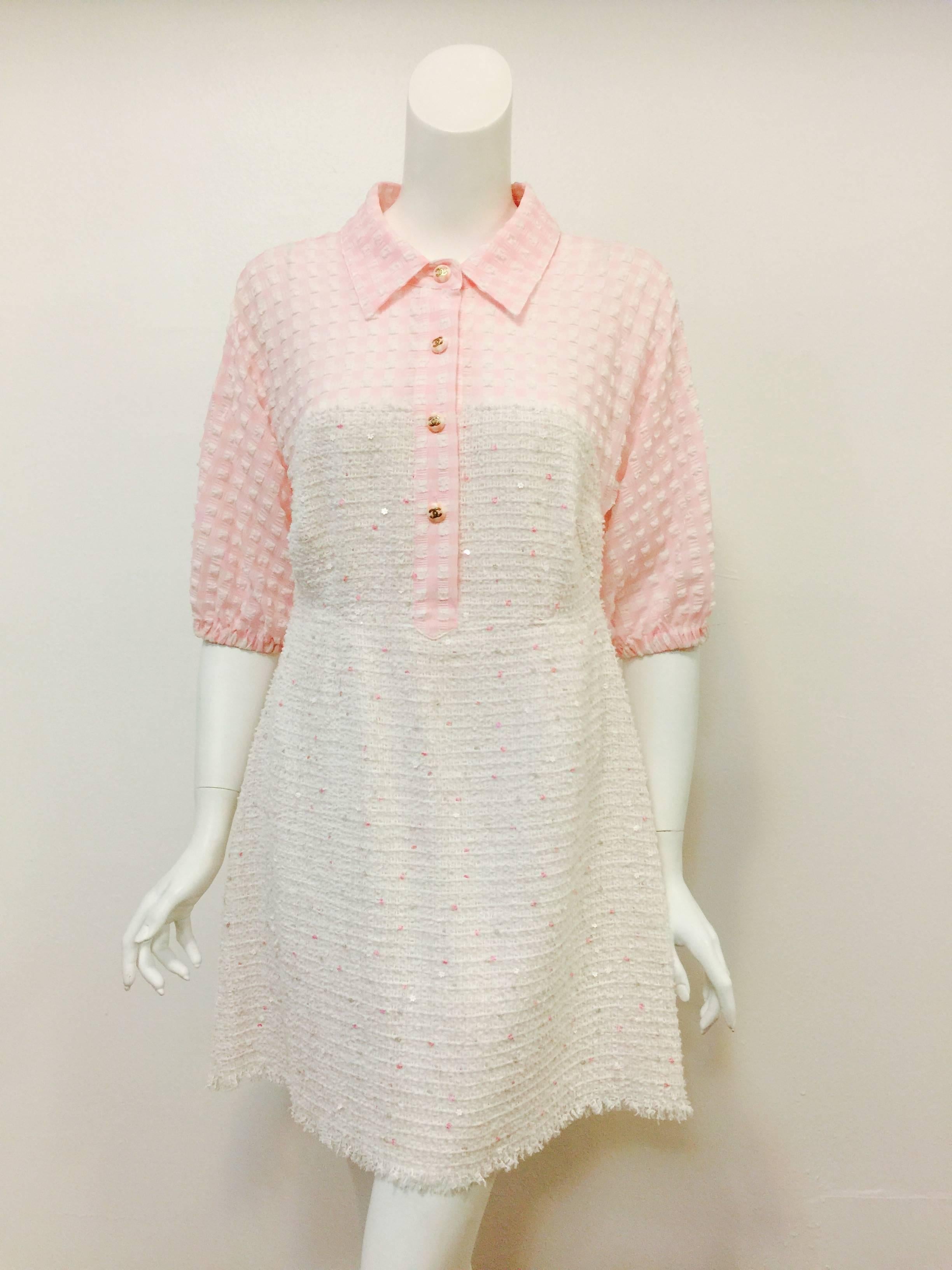 Chanel Tweed and Gingham Day Dress is whimsical and ultra-feminine!  Reminiscent of cotton candy, dress is rendered in pink and white tweed dotted with pink pink and white sequins.  Upper bodice, back and raglan pouf sleeves are crafted from a