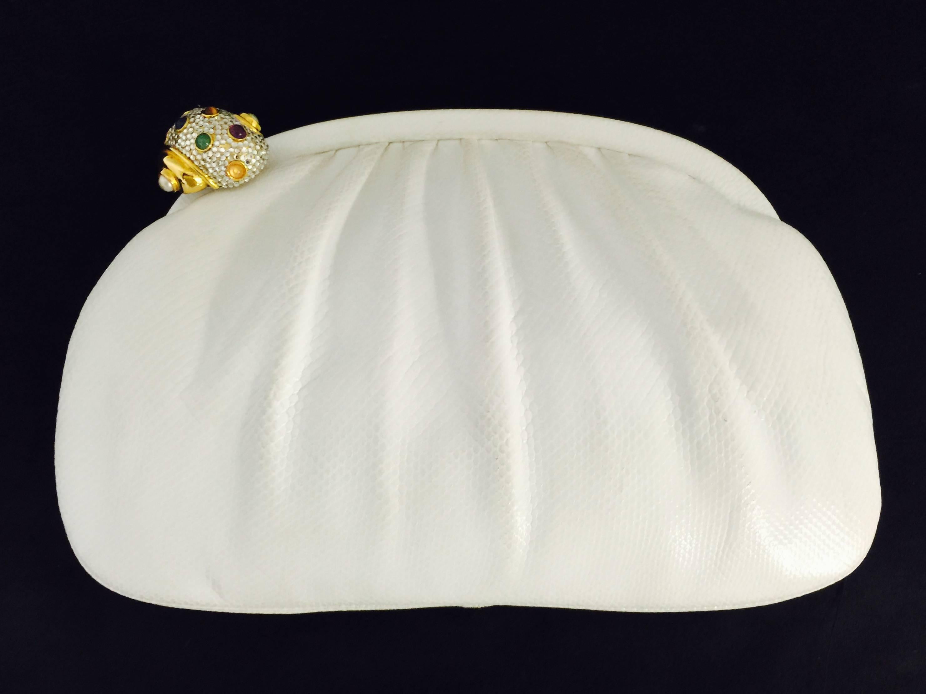 Vintage Judith Leiber White Lizard Convertible Clutch With Bejeweled Shell Clasp is highly desired by all collectors of Judith Leiber! Features slightly gathered, butter-soft lizard skin.  Easily converts from clutch to shoulder bag using lizard