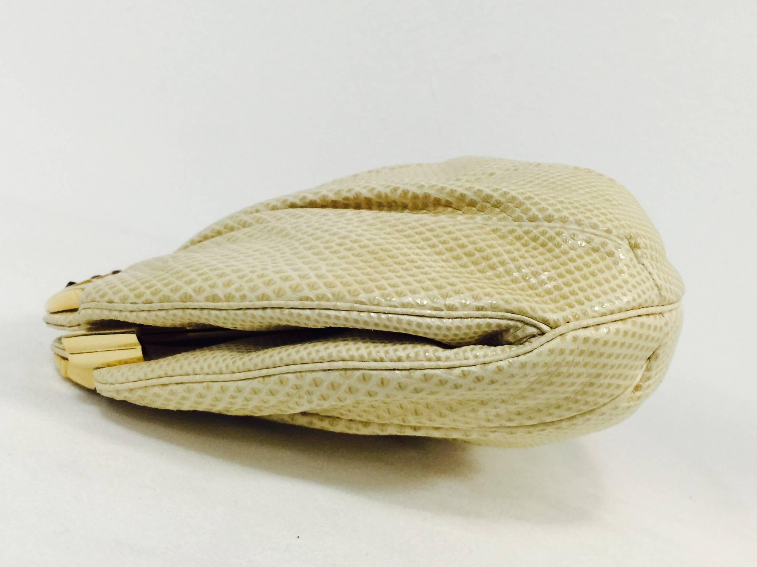 Vintage Judith Leiber Bejeweled Tan Lizard Convertible Clutch is highly desired by all collectors of Judith Leiber! Features slightly gathered, butter-soft lizard skin. Larger than the typical Leiber bag, easily converts from clutch to shoulder bag