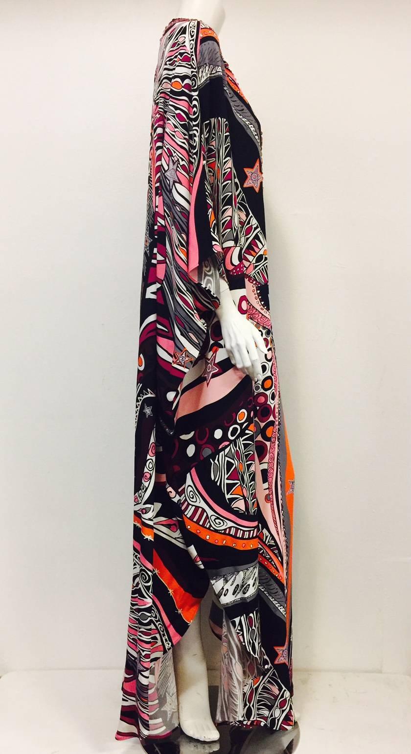 NWT Silk Abstract Print Caftan With Embellishments is highly desired by aficionados of all things Pucci!  Features ultra-luxurious, weighty silk and a signature, colorful Pucci print allover.  Seasonless color scheme works equally well in all