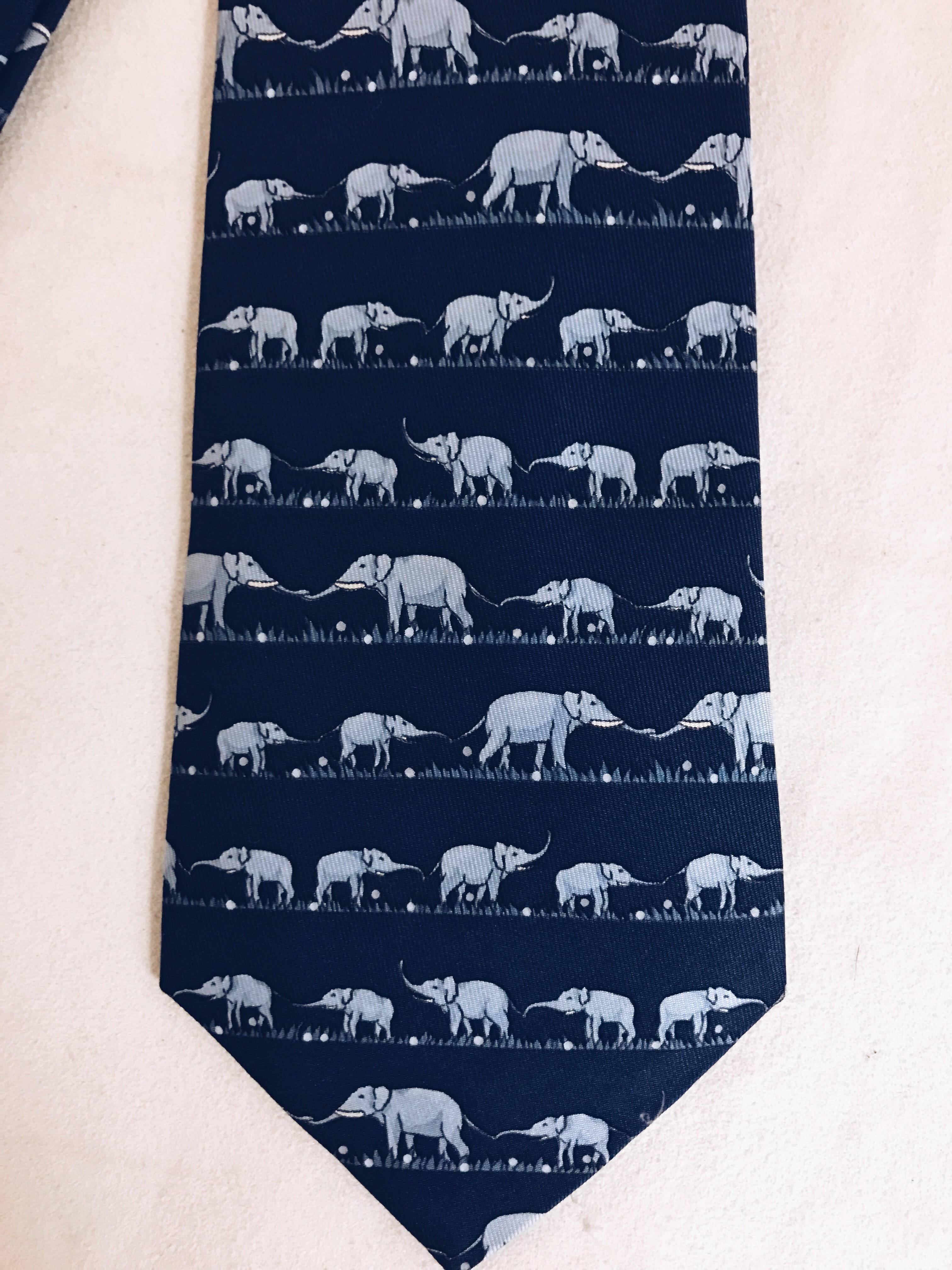 This Hermes tie with parading elephants is the perfect nod to your party affiliation, or just for the love of elephants!  In shades of blue, using the finest silk. Hand stitched finishes.