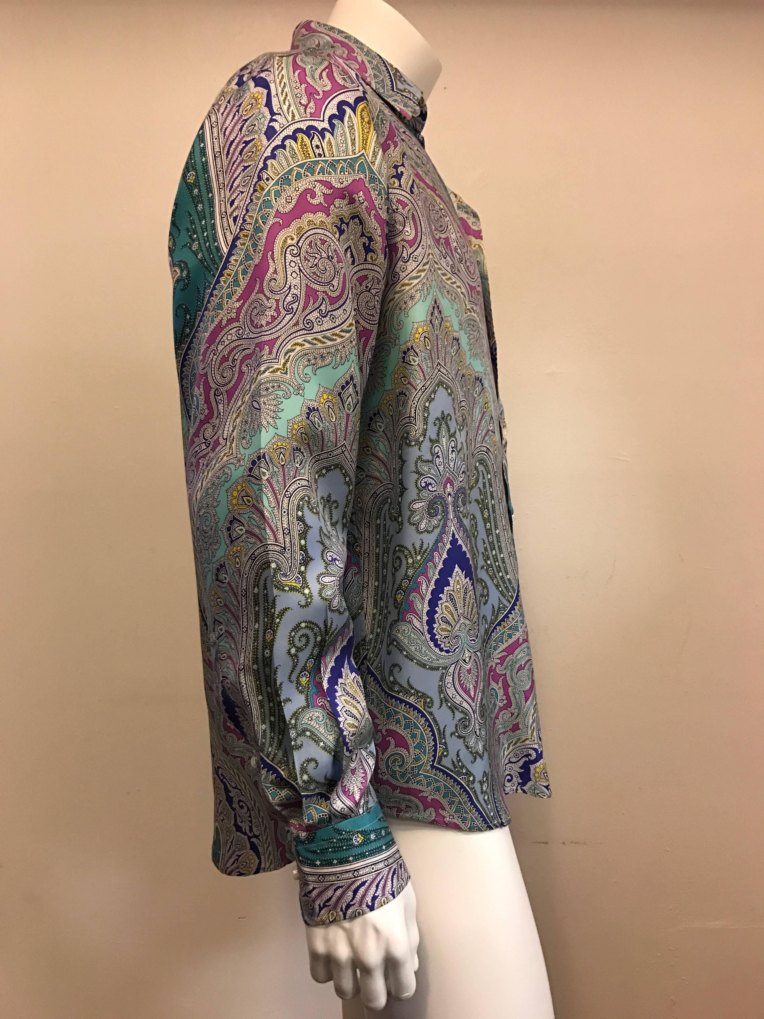 Ralph Lauren Purple Label makes a supremely soft silk shirt in shades of turquoise, orchid, celadon, purple and lemon paisley print on a pale blue background.  Removable collar stays, one button cuffs.  So very elegant! Measures 16.5 inches collar,