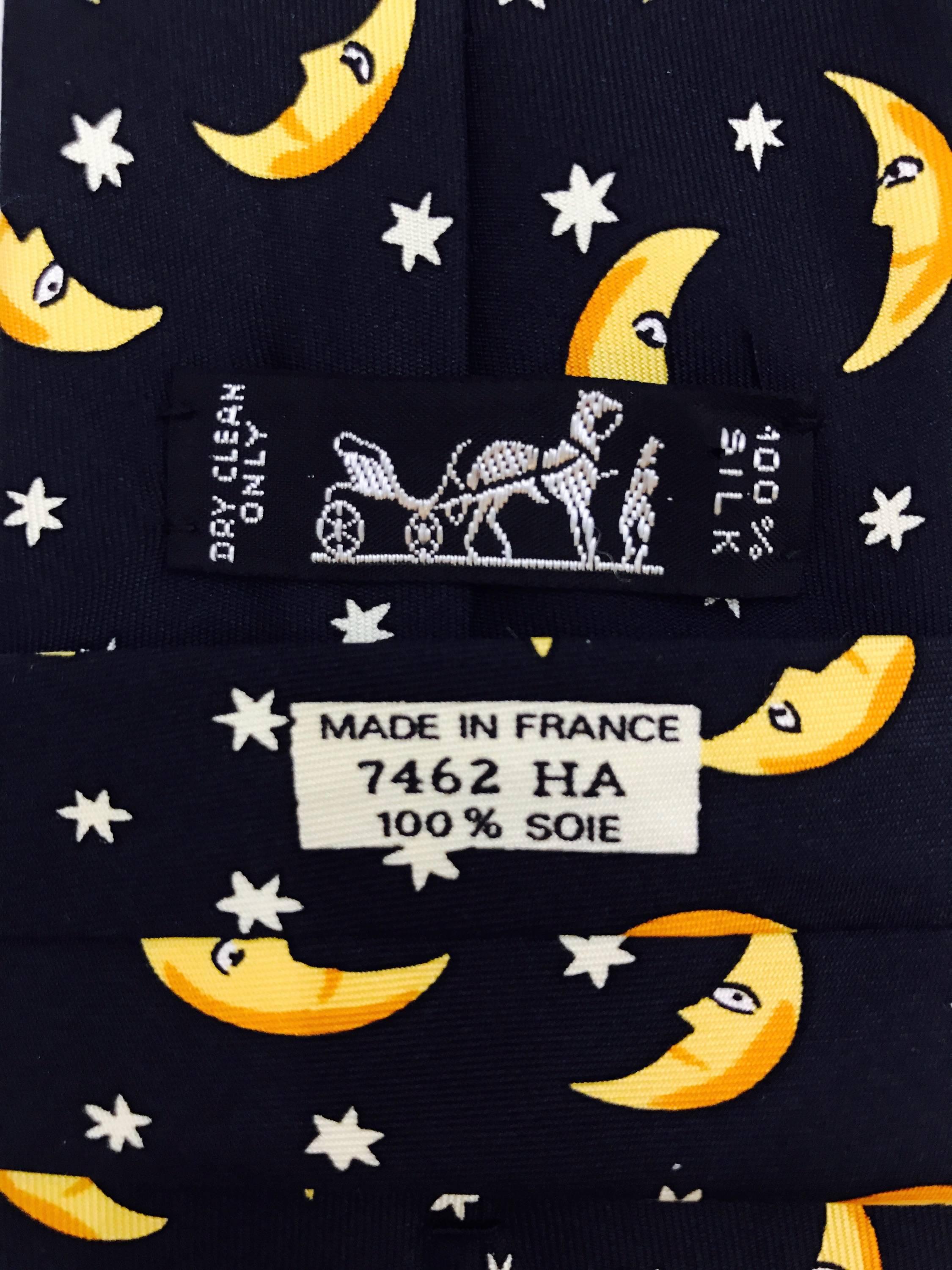 Another whimsy from the house of Hermes.  In black silk, this tie features smiling men in the moon, and twinkling stars.  A fun tie for night or day!