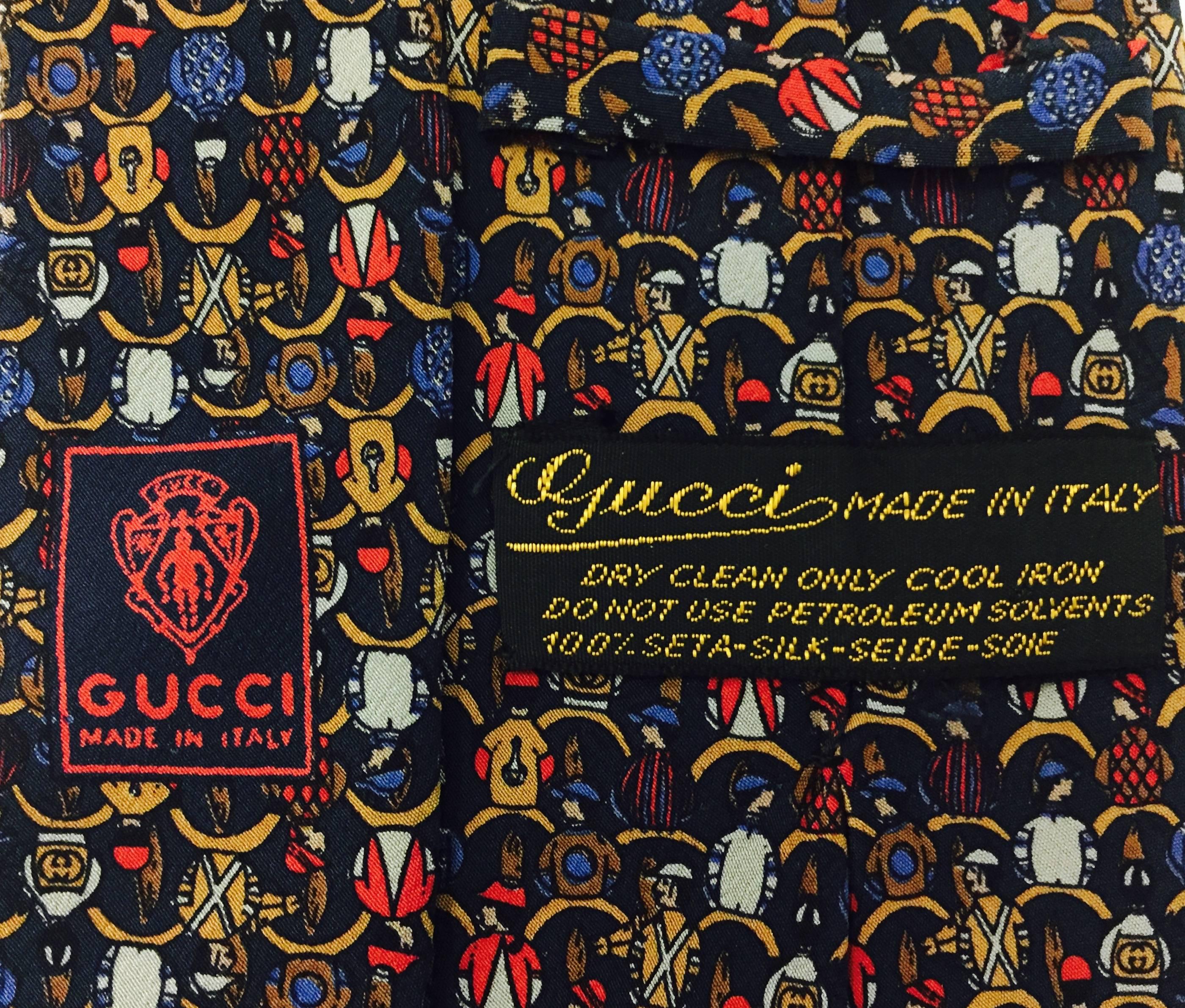 Men's vintage Gucci necktie is perfect for the race fans who look forward to the Triple Crown of racing...The Kentucky Derby, the Preakness and Belmont races!   It takes a close look to see the whimsical pack of jockeys on their mounts as viewed
