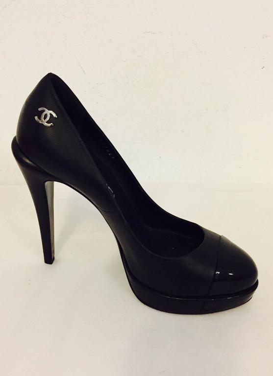 chanel black tip shoes