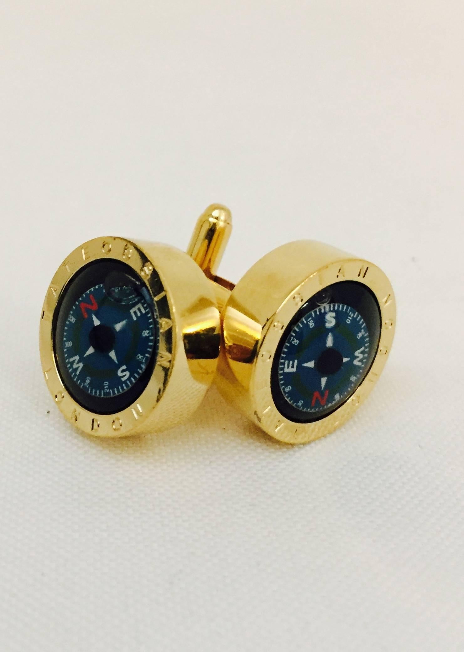 Always know where you are! these playful cufflinks by Tateossian feature working compass'.  Tateossian is a firm in London known for their unusual cufflinks with mechanical movements, and unusual stones. Yellow gold plated casing.