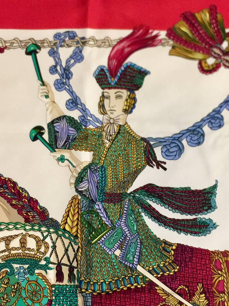 This Vintage Hermes Le Timbalier scarf, despite it's equestrian look, is not dedicated to the Horseman but to his trade.  Le Timbalier is defined as a performer (Timpanist) who plays 2 or more kettledrums, as noted on this outstanding Hermes