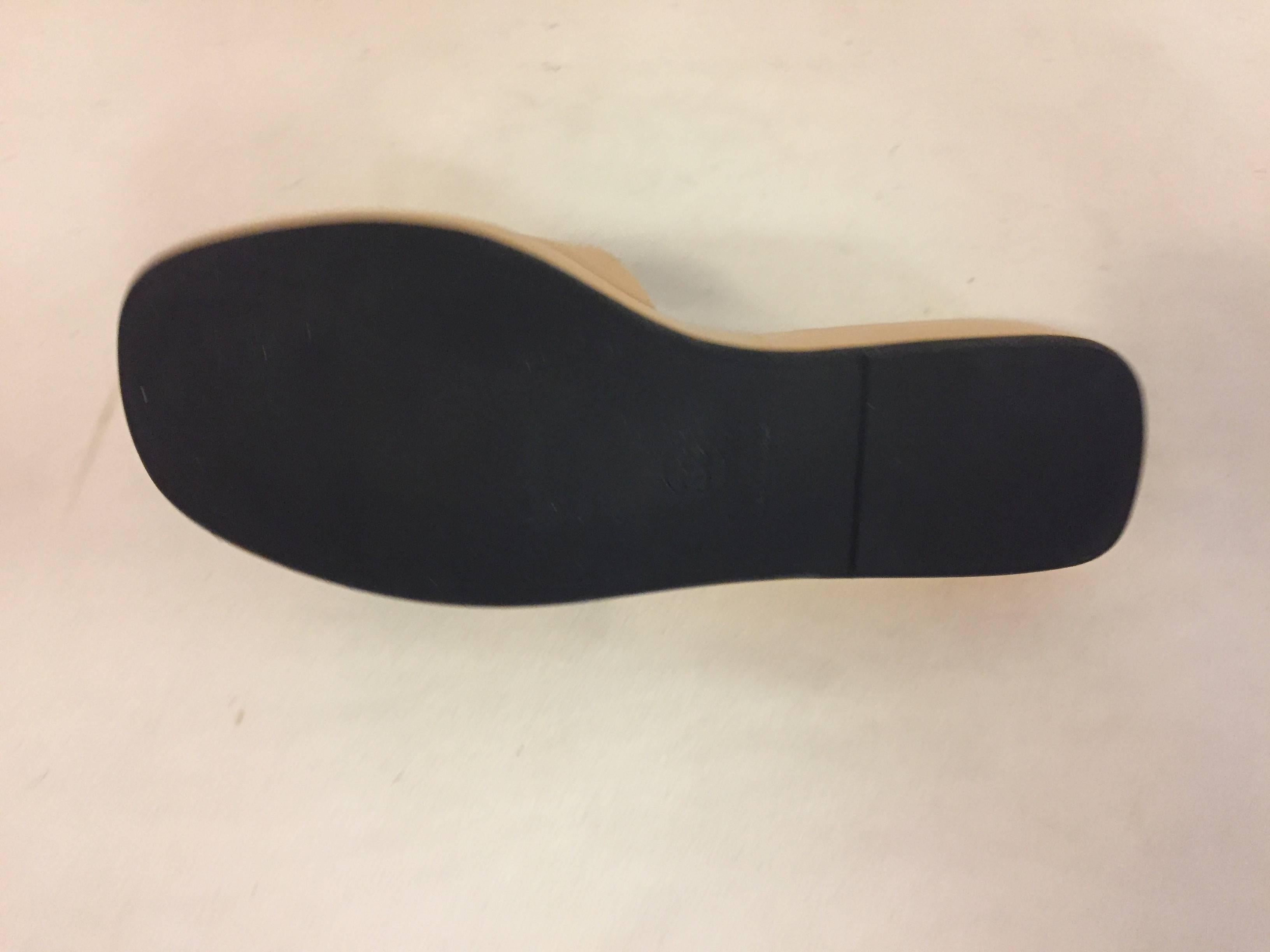 Brown Chanel Cambon Beige Quilted Slides with Black Interlocking CC in Black