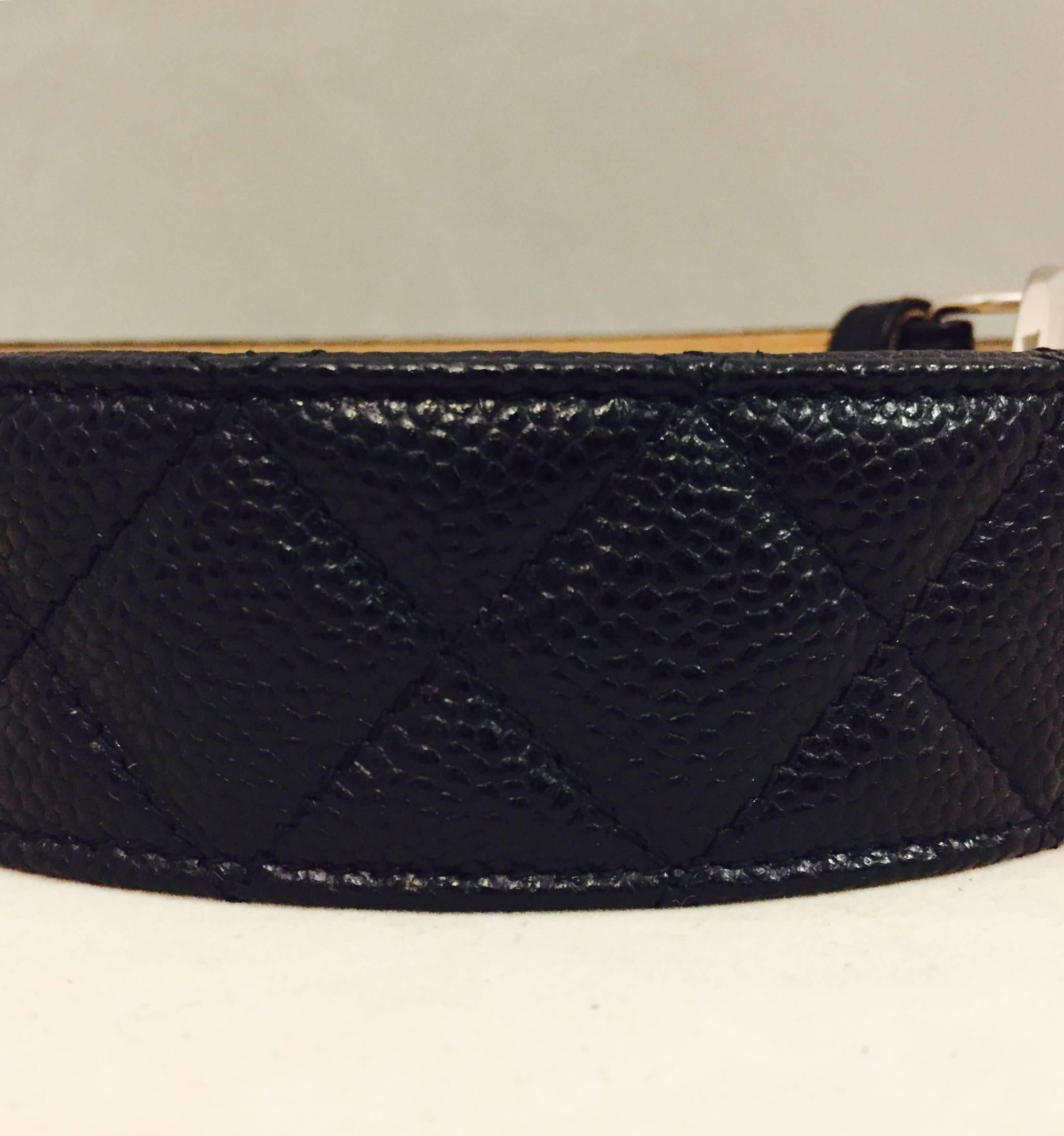 From the iconic Chanel Maison comes this very chic black belt!  Fabricated in Coco's Caviar leather that has been diamond quilted, featuring the ever recognizable CC logo in high polished silver tone.  Buckle measures 2.5" wide and 2"