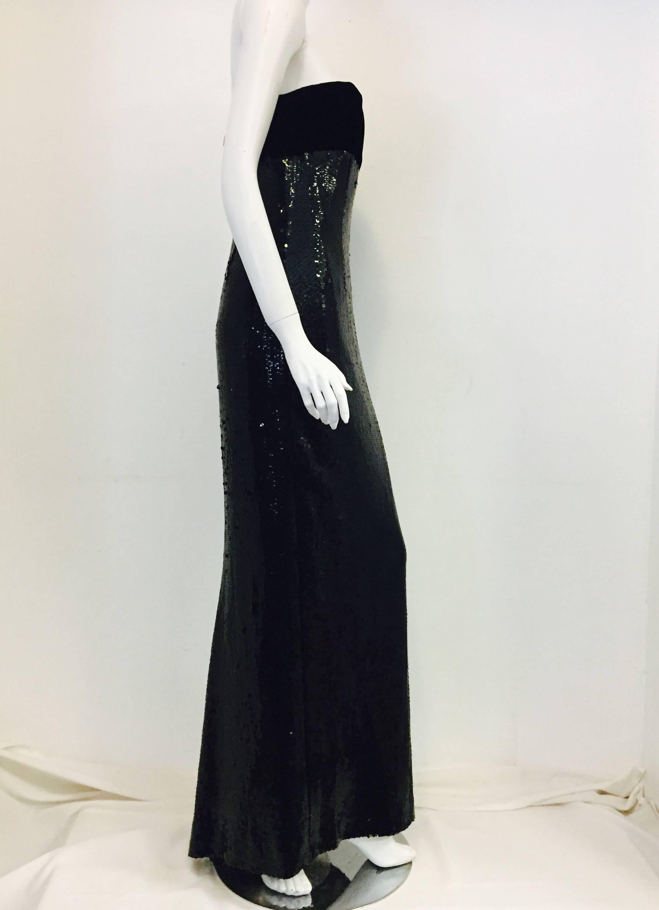 Brilliant Bill Blass vintage 80's gown with Black Velvet bust area and complemented with fish scale sequins down to the floor. Fitted  gown fully lined and in excellent condition. A gown 